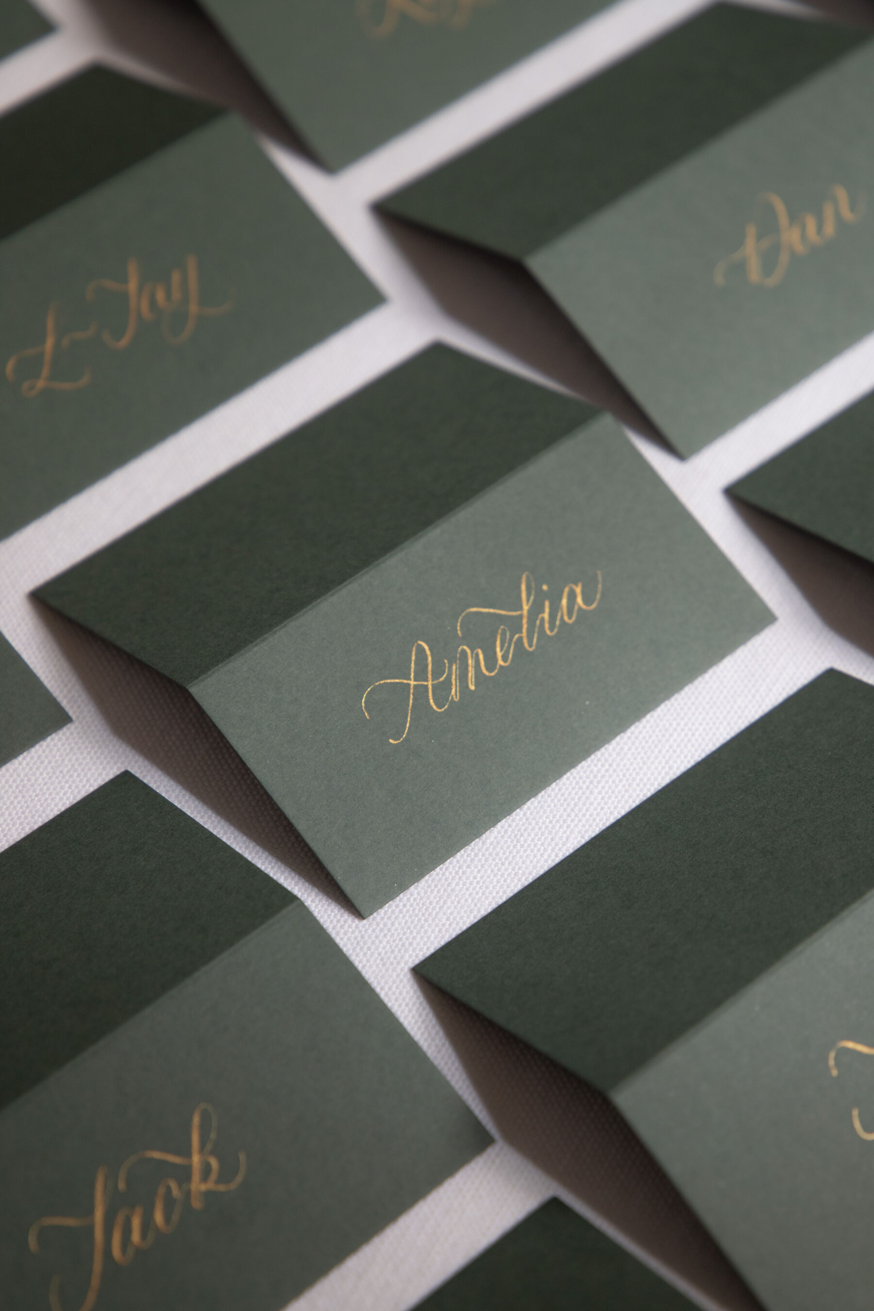 Gold calligraphy place cards