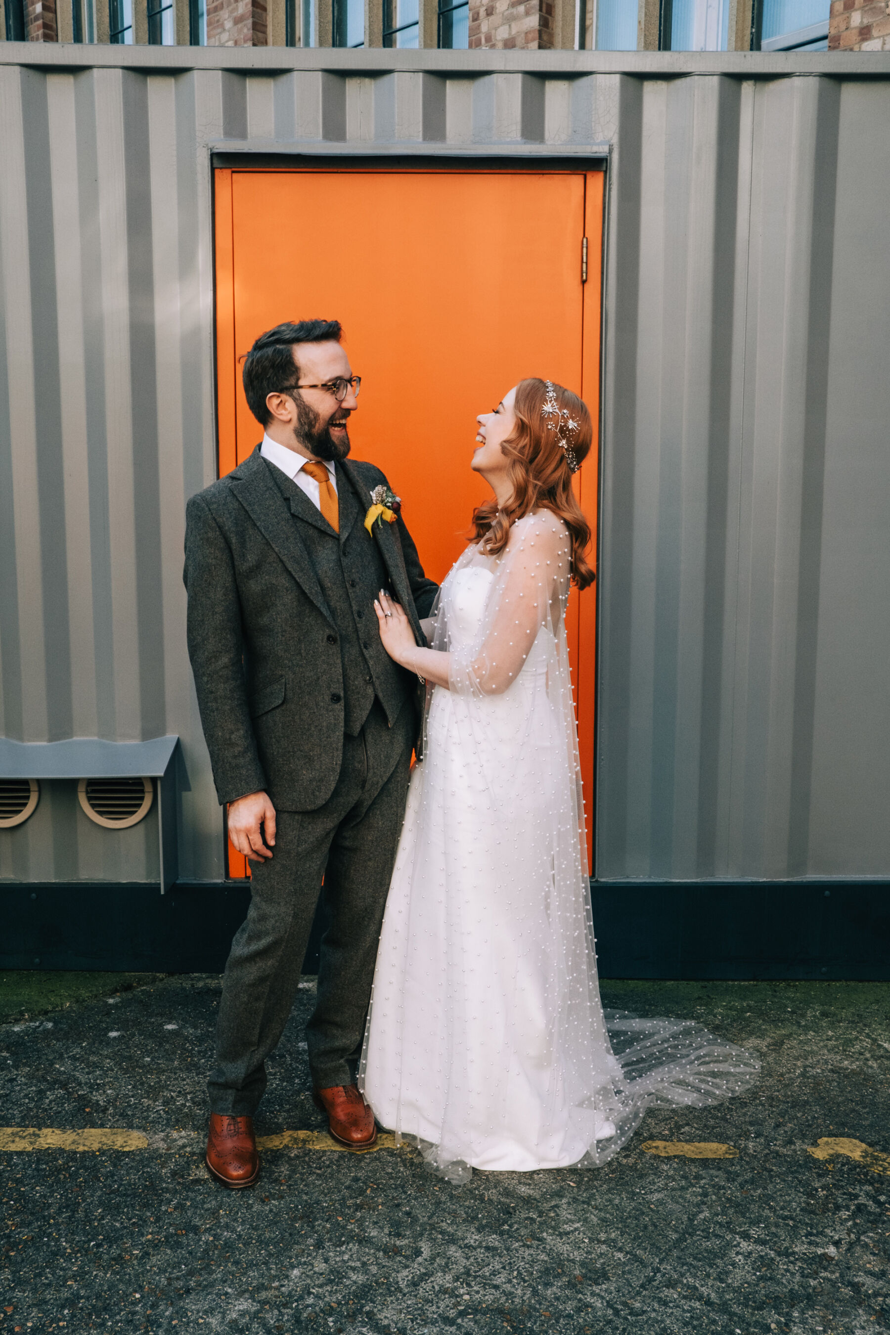 A Trinity Buoy Wharf Wedding With Subtle 70's Style for Jo, in a Sassi Holford Gown & Pearl Cape Veil by Jesus Peiro 46 87 Trinity Buoy Wharf Wedding