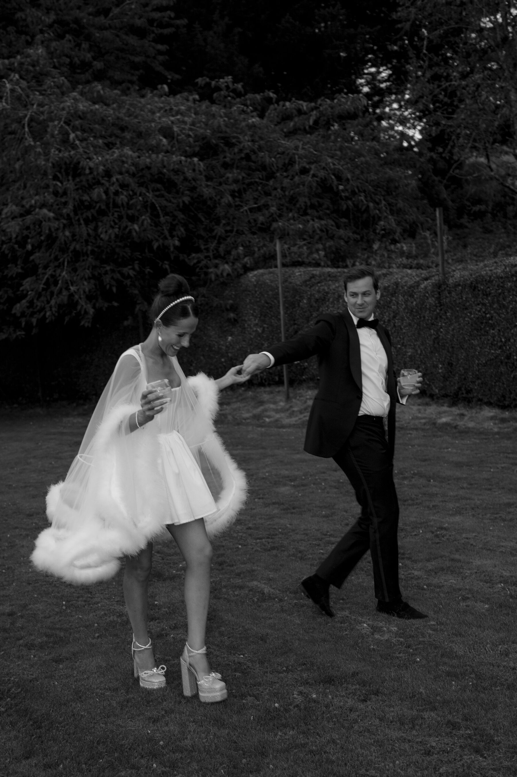 A Huge Bow, Mini Dress & Feathers & Lots of Effortless Glamour & Fun for Ellie & Fred's Country House Wedding at Pennard House in Somerset 60 262 Pennard House Wedding Kate Edmondson Bridal dress 1