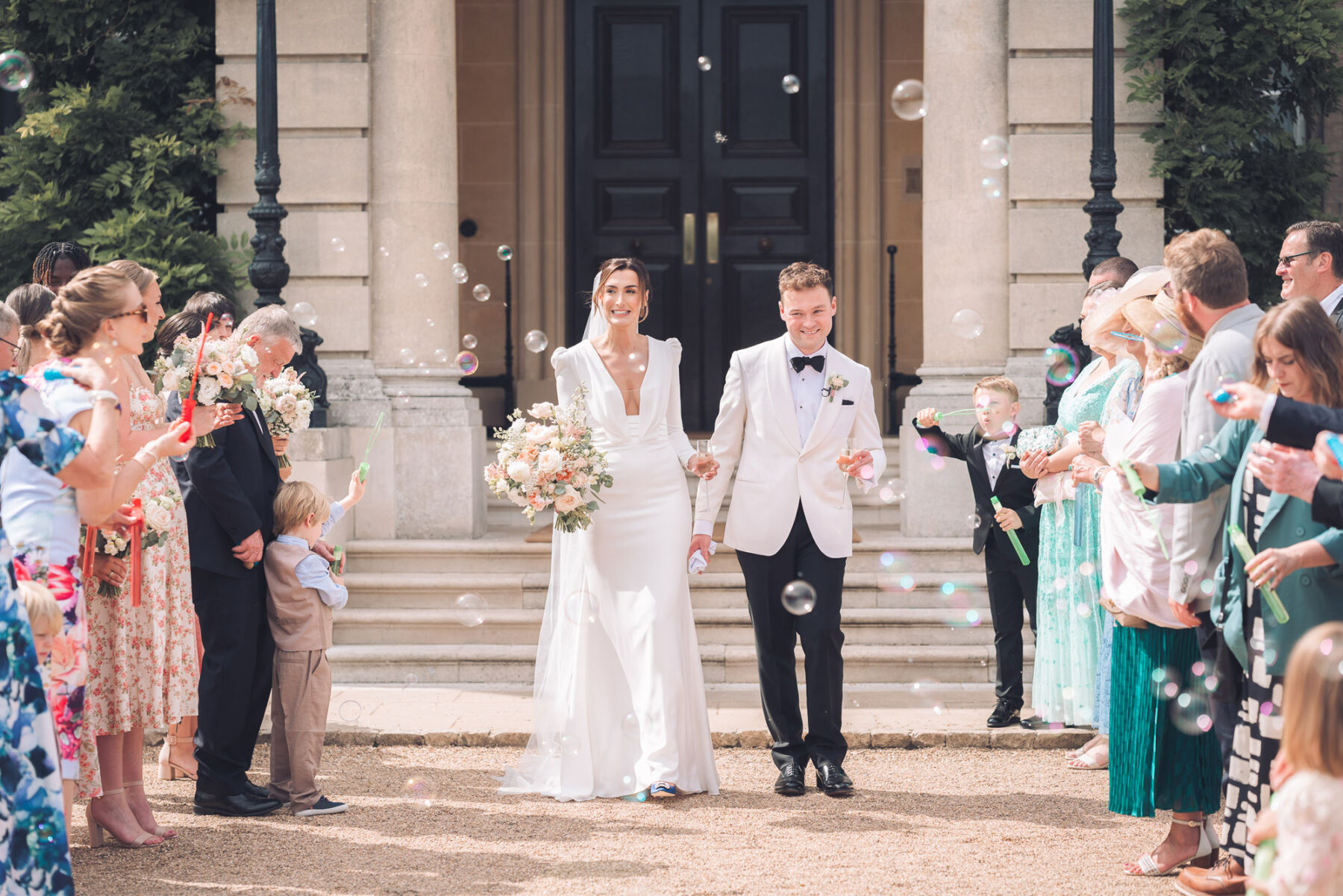 Grace, in Pronovias, for her Classy & Elegant Black Tie & White Tux Wedding Wedding at Hedsor House 30 93 Hedsor House wedidng Pronovias bridal gown