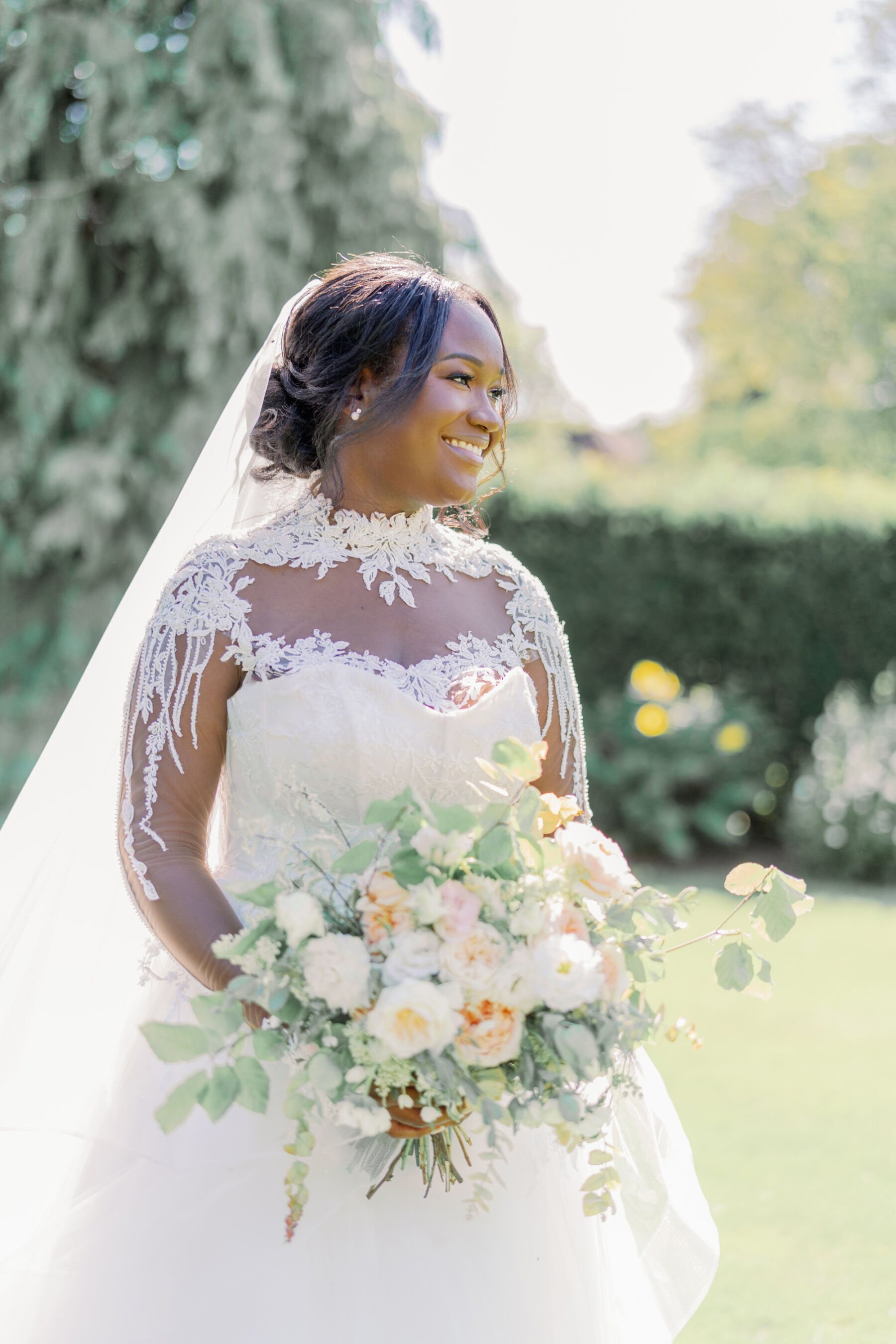 Black bride in elegant lace wedding dress