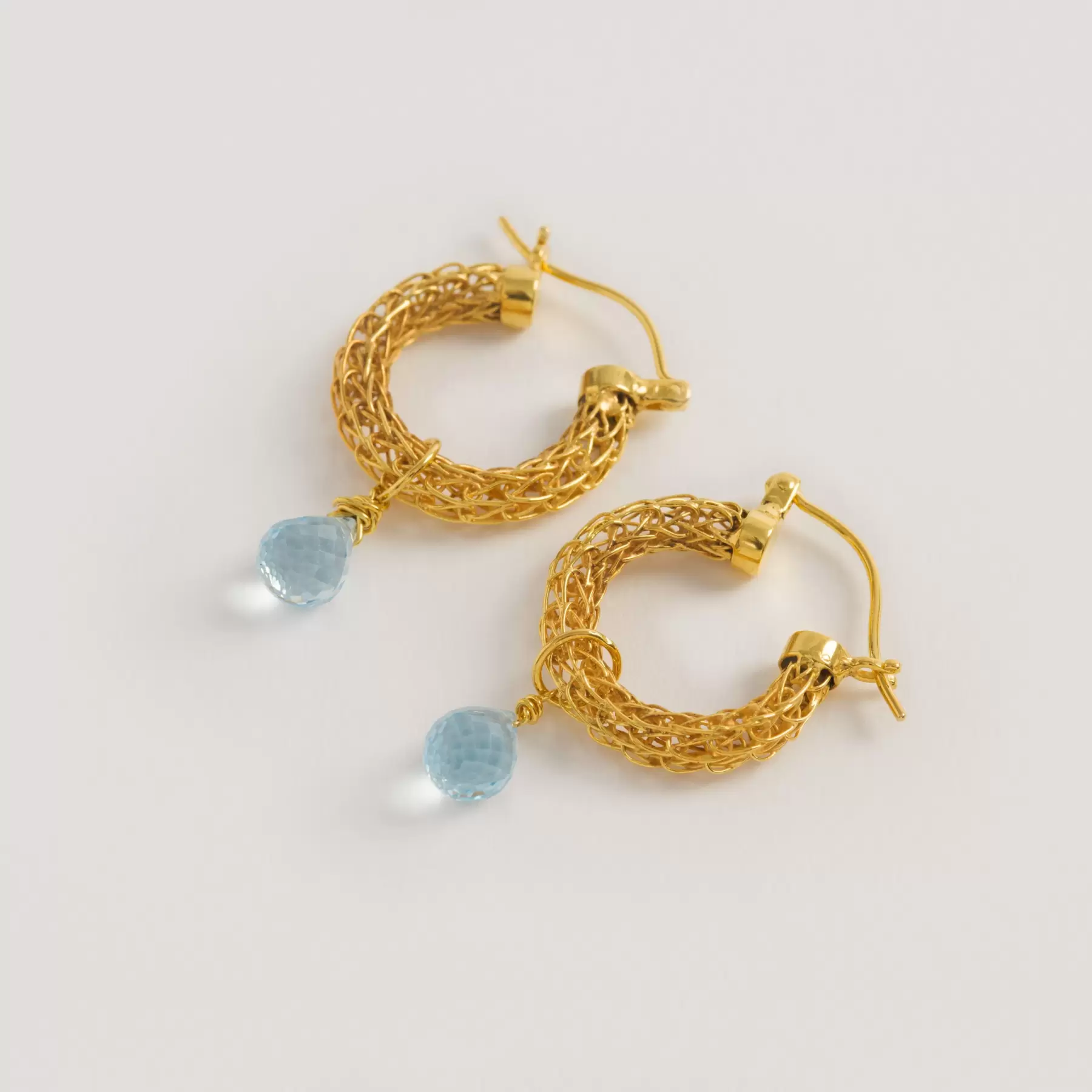 Gold Weave Mini Hoop Earrings With Blue Topaz Charm