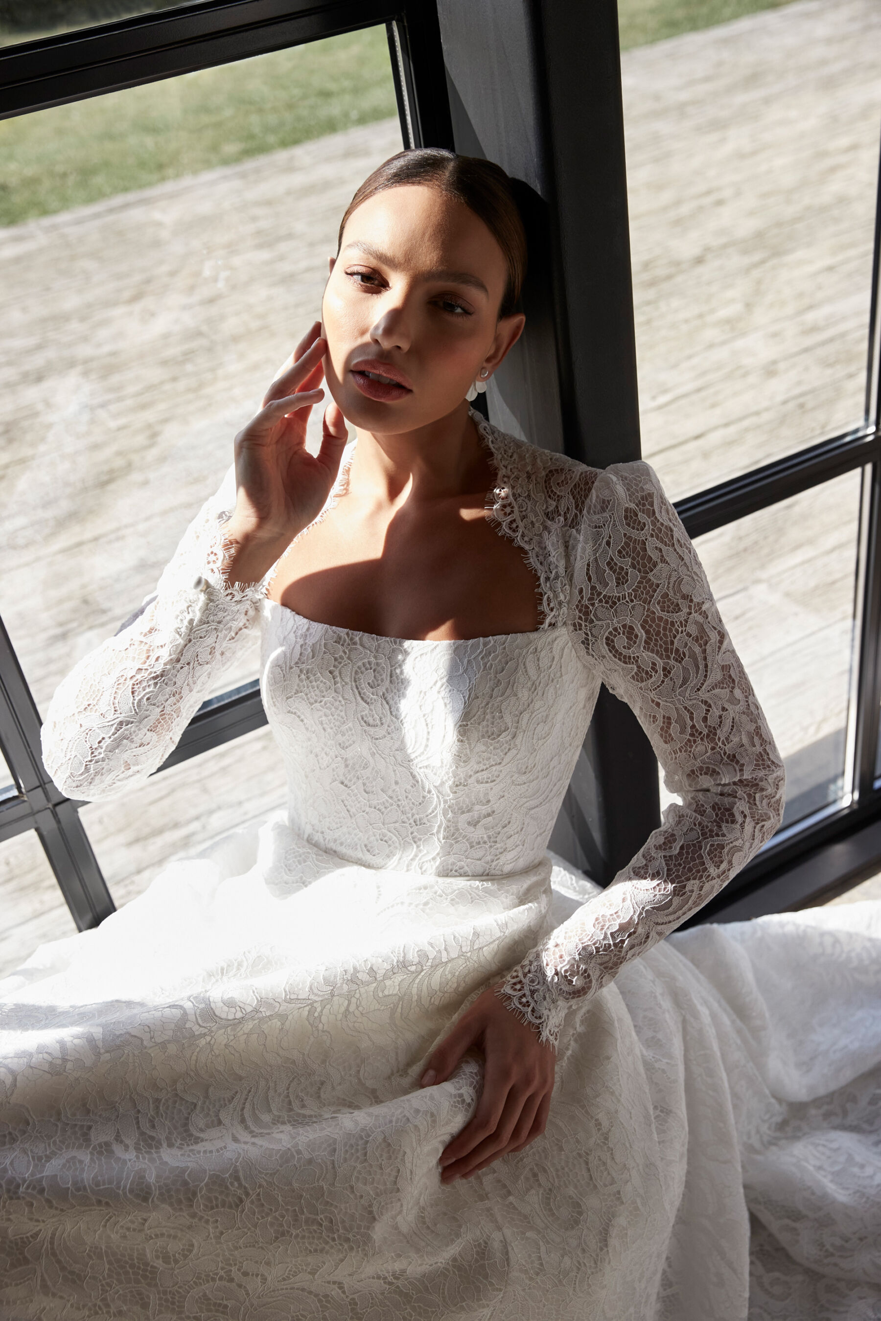 Lace wedding dress by Sassi Golf