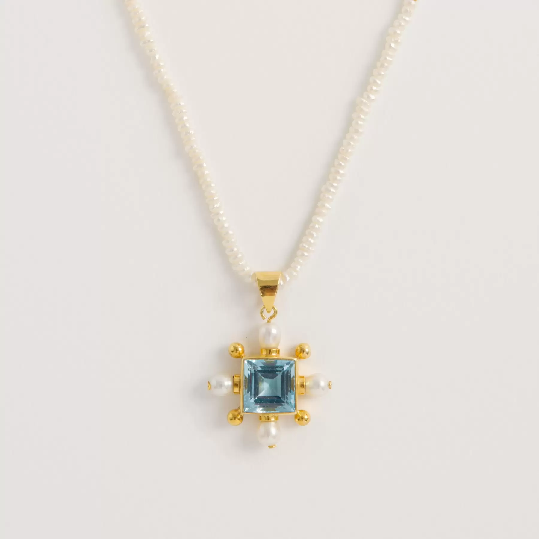 Seed Pearl Necklace with Blue Topaz Cross Pendant