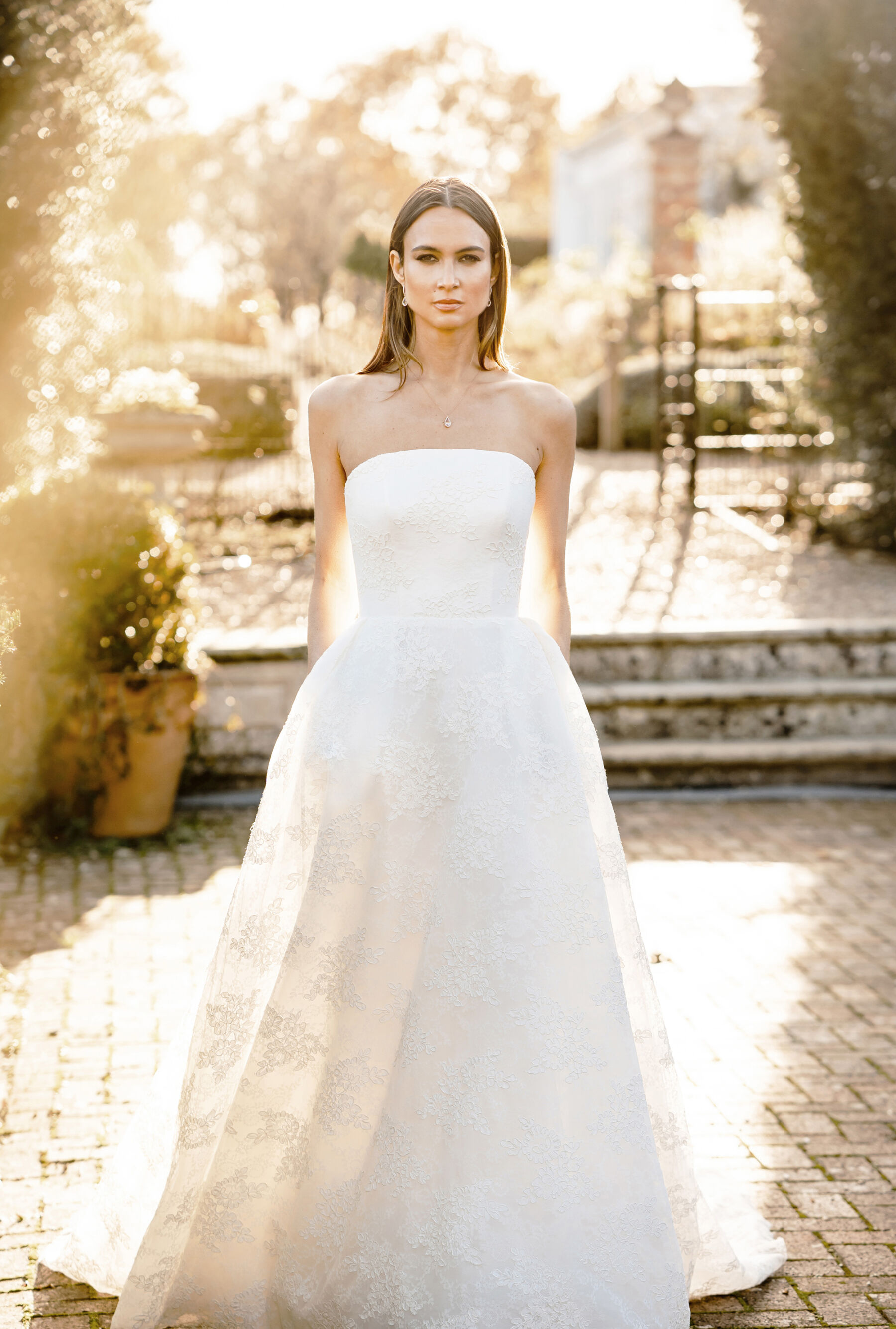 Caroline Castigliano modern strapless wedding dress available at Carina B Couture bridal boutique.