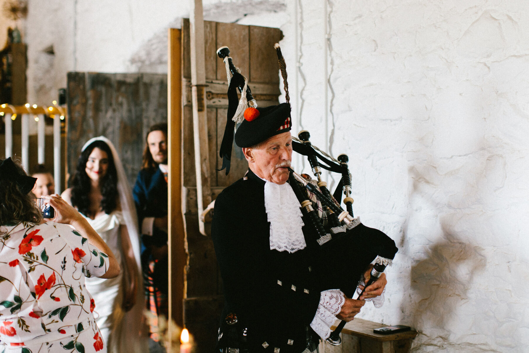 Scottish piper at a wedding.