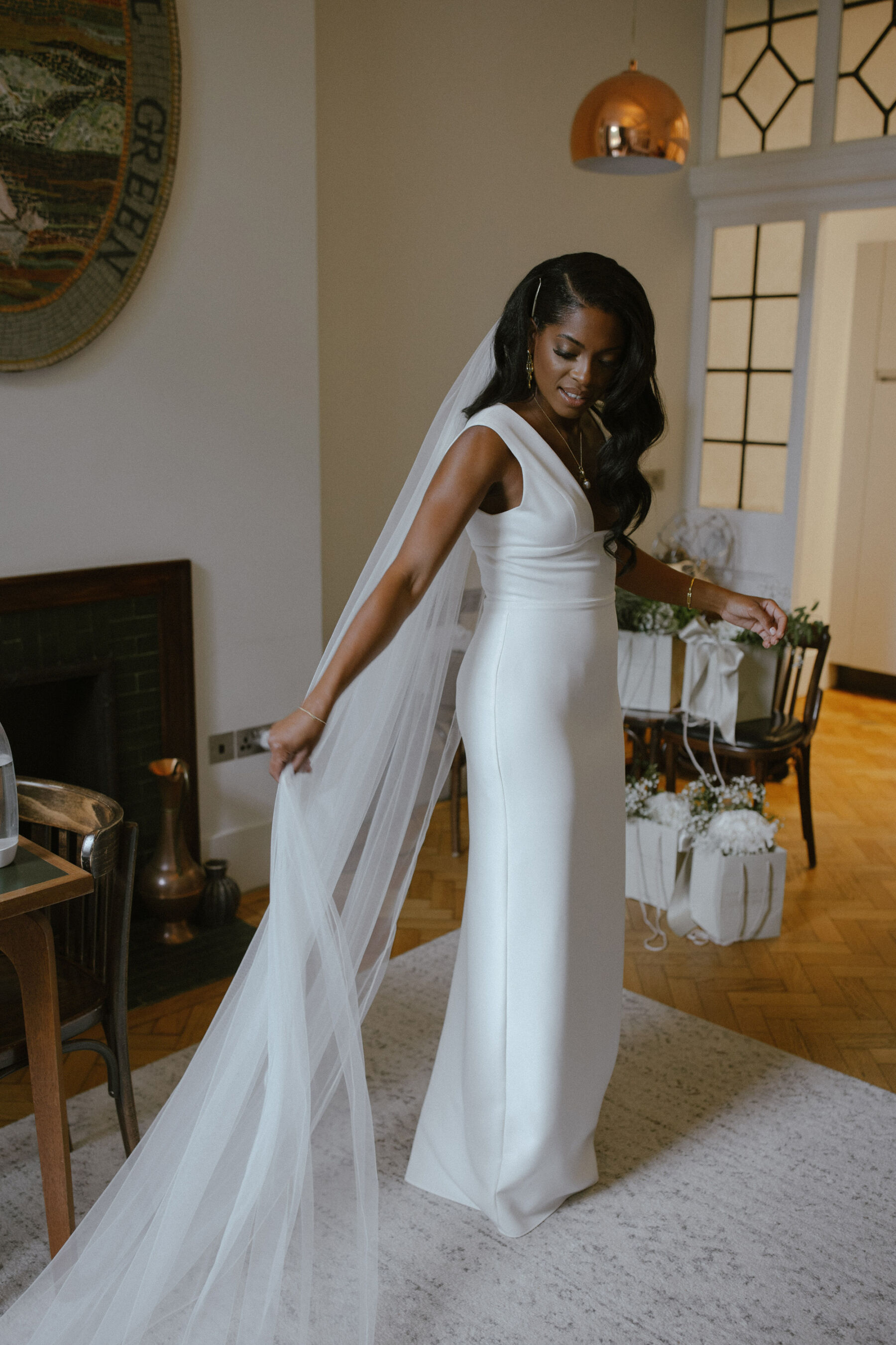 Beautiful Black bride wearing a modern, chic, minimalist Sarah Seven wedding dress. Ruth Atkinson Photography.