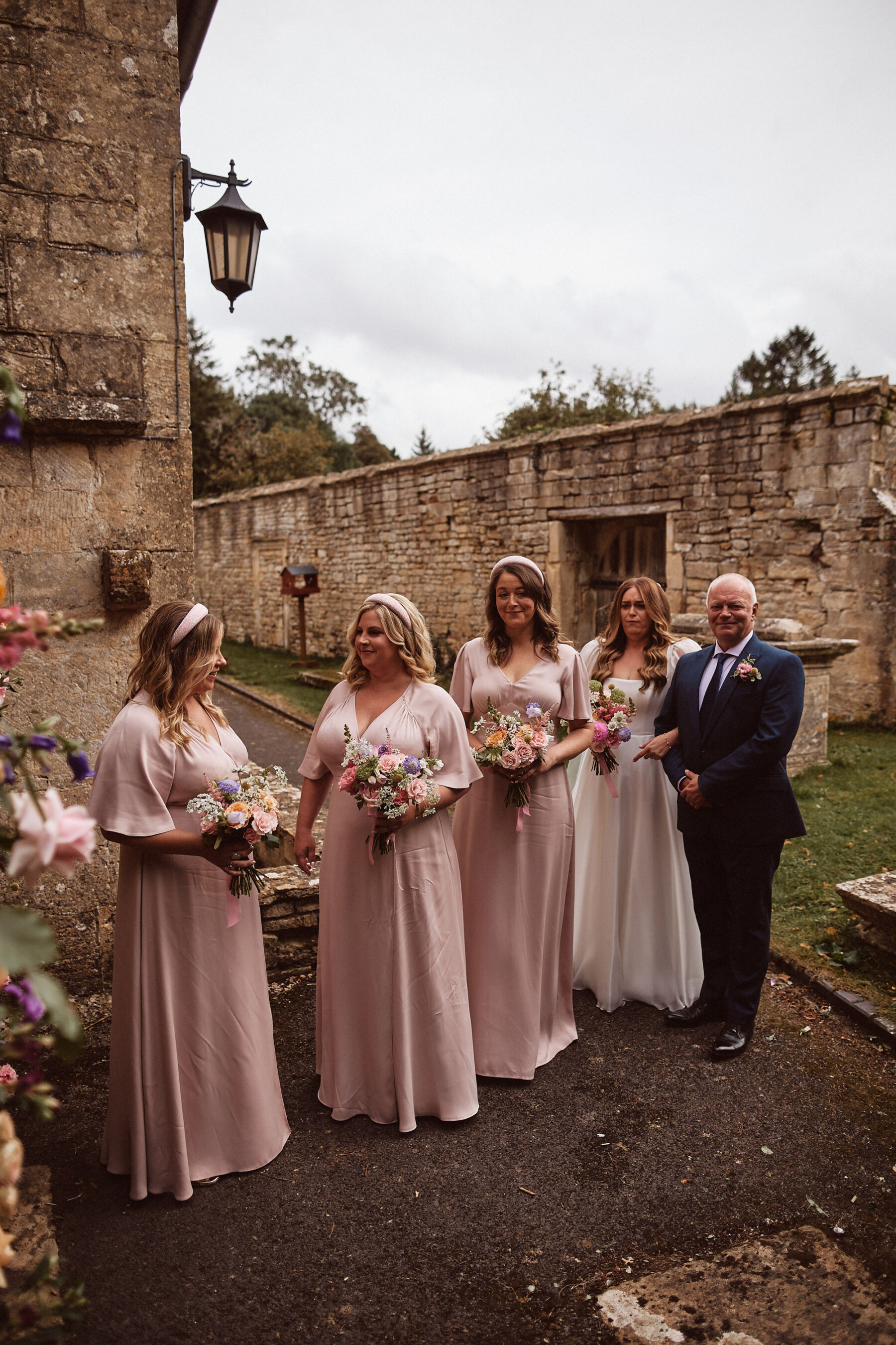 Bridesmaids in pink Maids to Measure bridesmaids dresses.