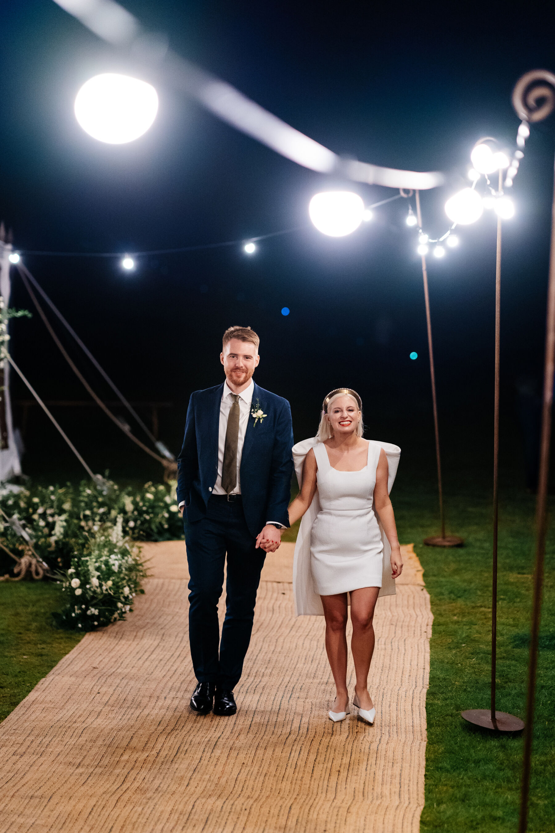 Emilia Wickstead short wedding dress with large bow.