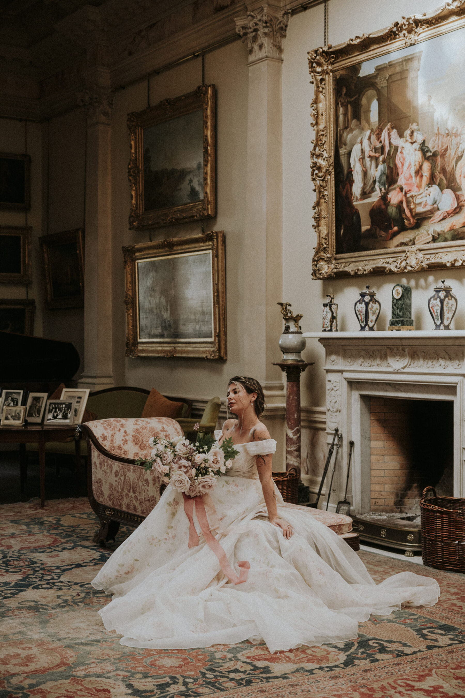 Romantic bride wearing a floral wedding dress by Josephine Scott London. Pastel colour bouquet. Gosford House wedding editorial photoshoot.