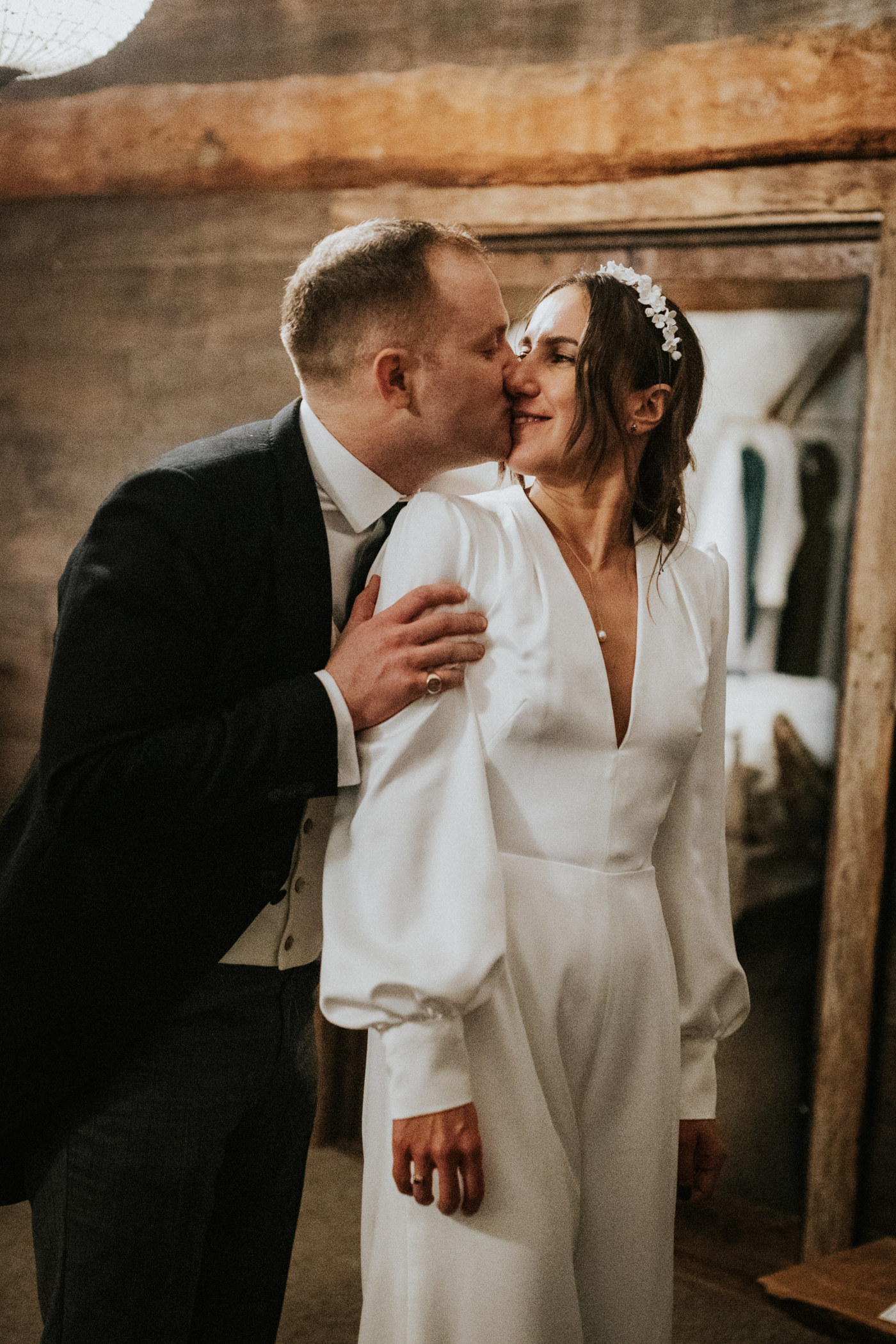 Bride in a wedding jumpsuit by Dandelion & Pearls