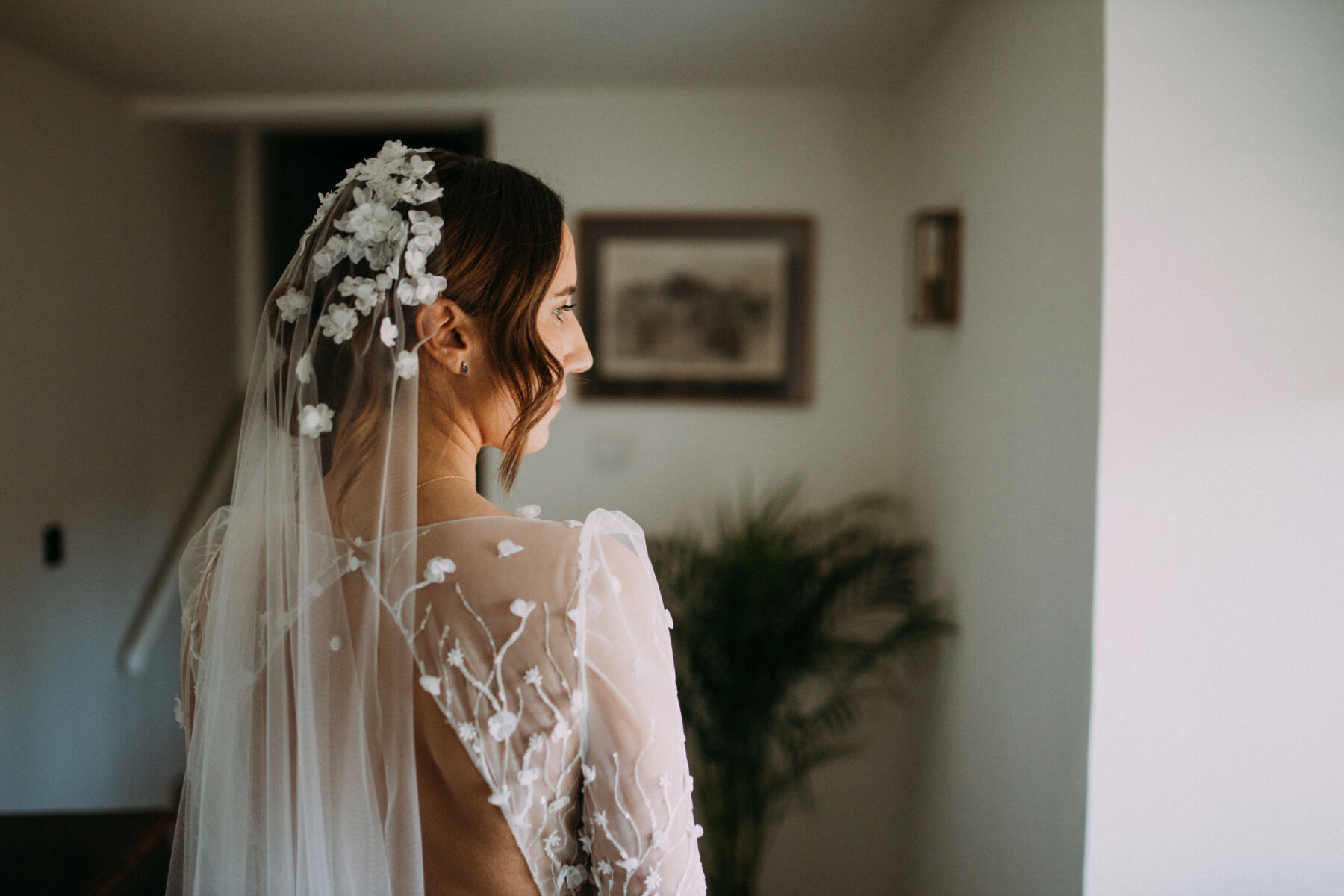 Bride wearing the Lara dress & Lunaria Veil by Rime Arodaky, from The Mews Bridal boutique.