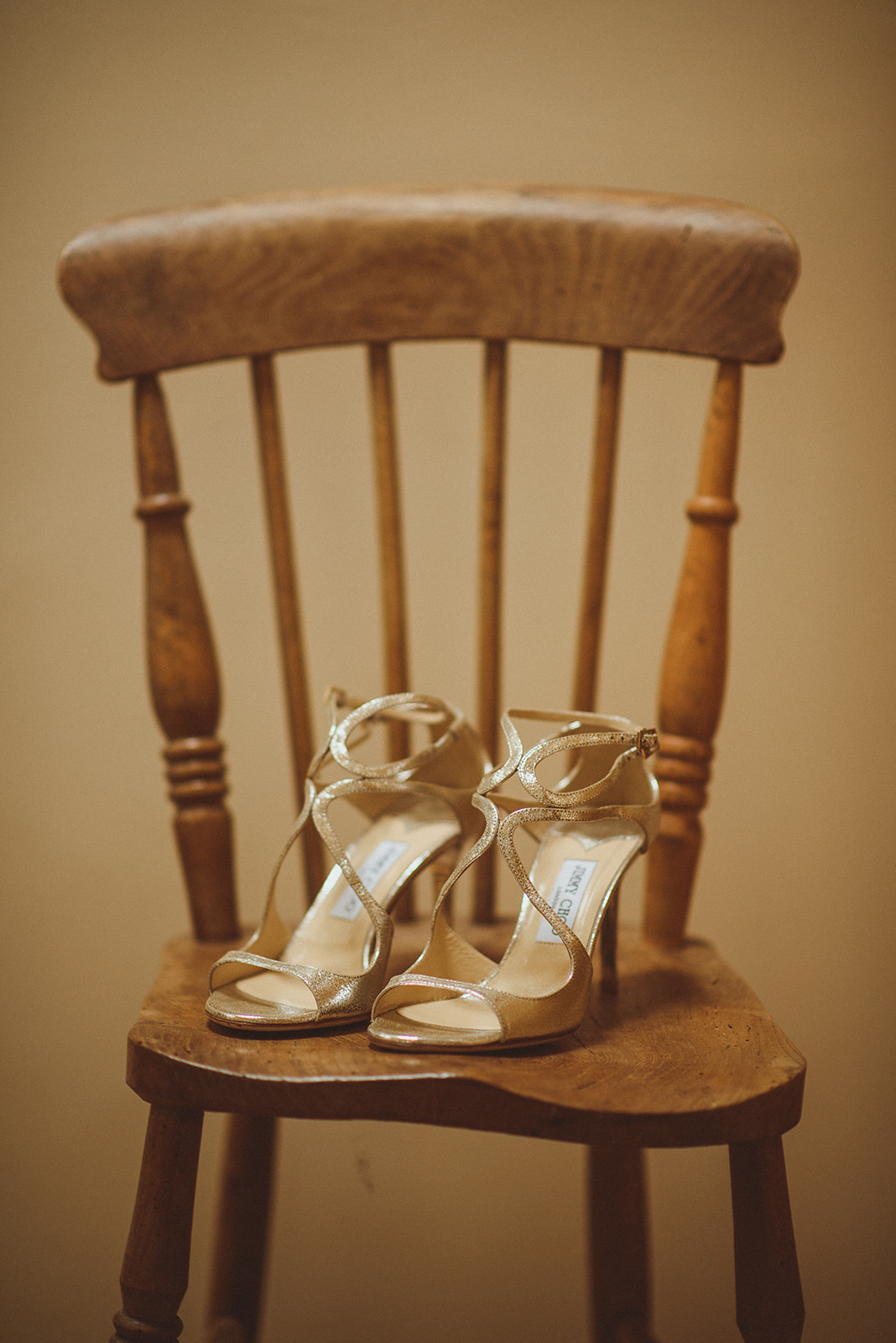 In Her Own Style Part 5: Rebecca's Decision To Switch Her Wedding Dress Before the Big Day at Tythe 8 Gold strappy high heel Jimmy Choo wedding shoes. Matt Penberthy Photography.