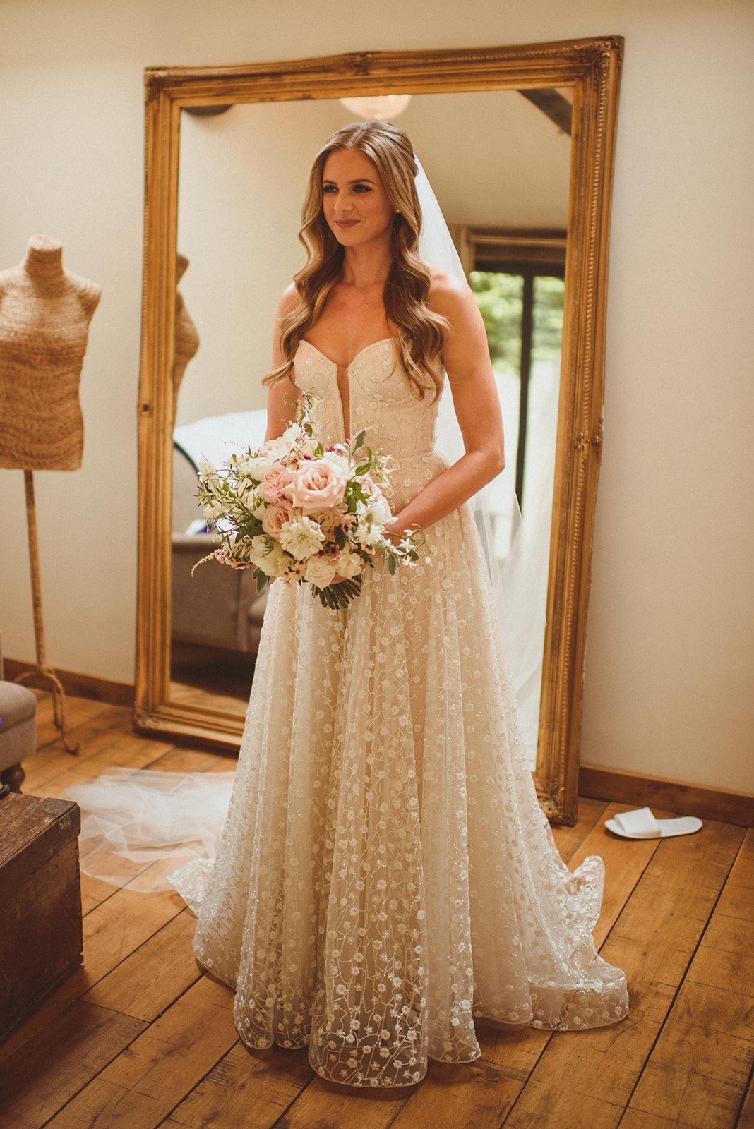 In Her Own Style Part 5: Rebecca's Decision To Switch Her Wedding Dress Before the Big Day at Tythe 10 Bride standing by a full length mirror ready to be married. She wears the Hopkins wedding dress by Pronovias. Matt Penberthy Photography.