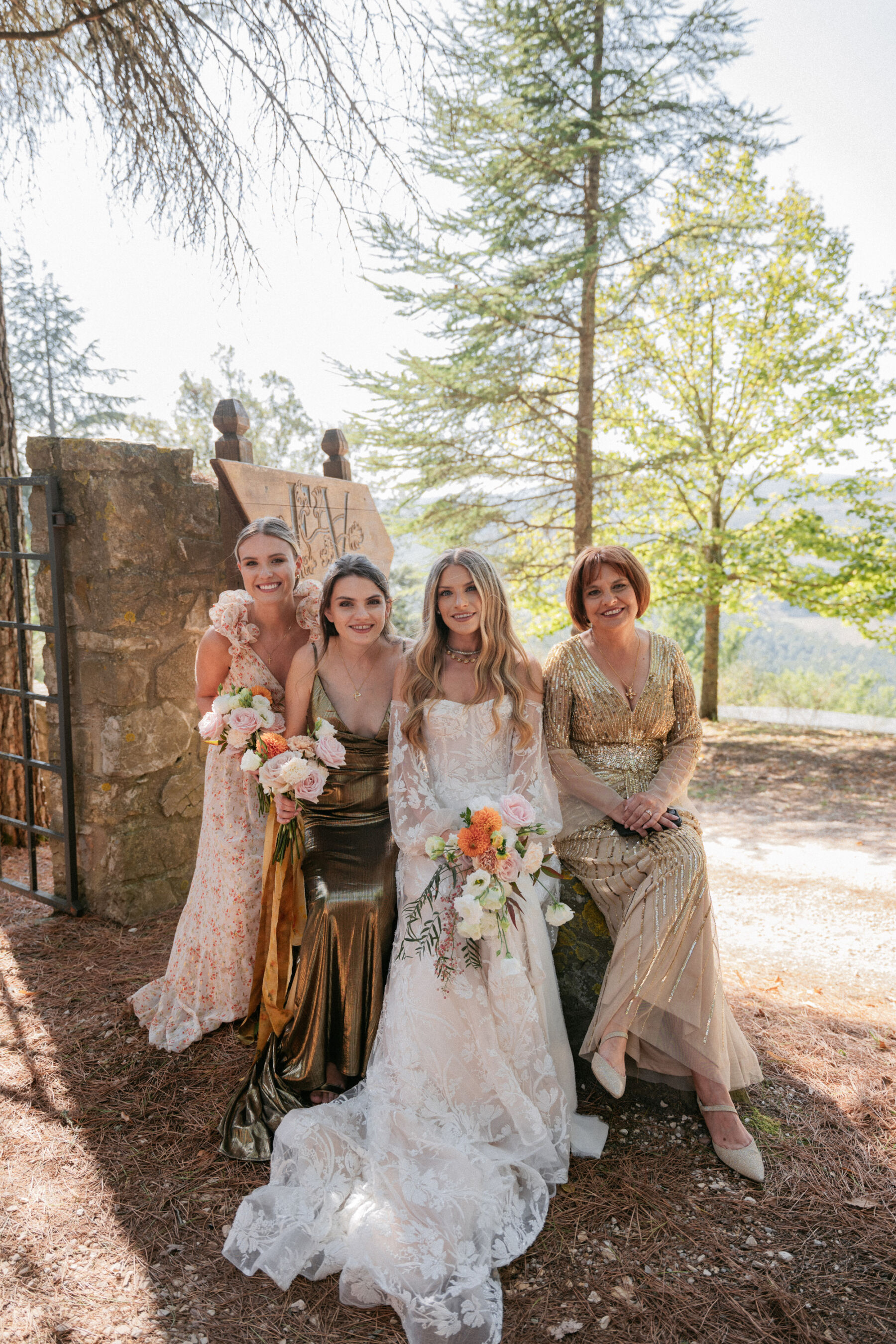 Mikaela in Alena Leena For Her Elegant Italian Wedding at Villa Fattoria di Vibio 16 Bride wearing an Alena Leena wedding dress with her bridesmaids and mum before the wedding ceremony in Italy. Photography by Stefano Santucci.