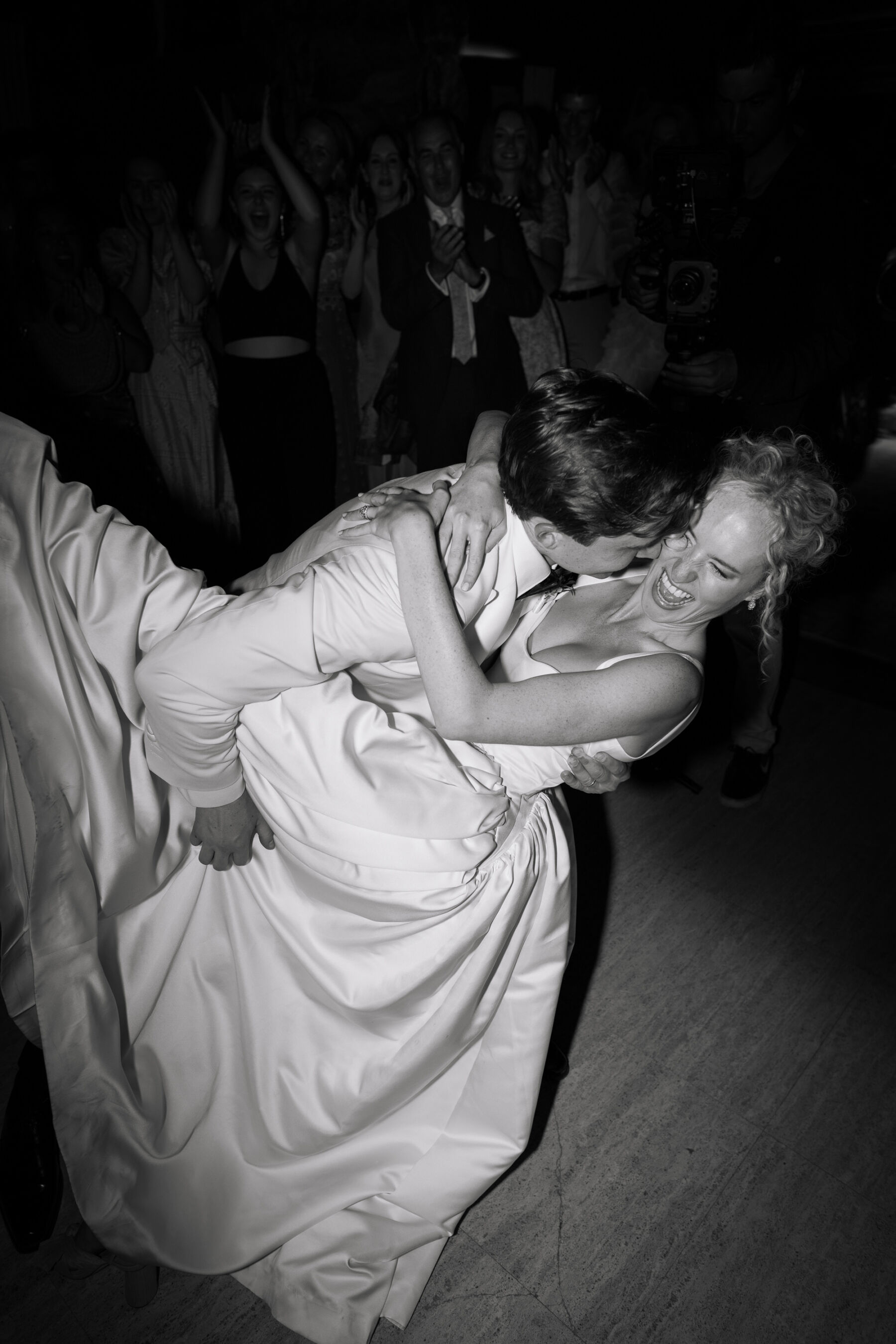 Georgia in Emilia Wickstead, For Her Classy & Elegant Black Tie Mountain Wedding in the Chamonix 40 Bride in an Emilia Wickestead dancing with wild abandon on the dancefloor with her groom in white Tuxedo.