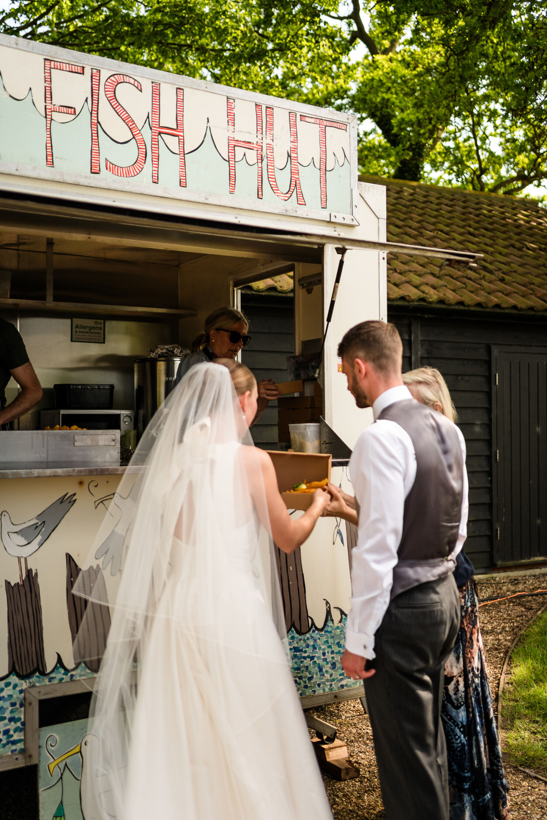 Alice Wore Oak by Halfpenny London For Her Charming Spring Marquee Wedding in Suffolk 34 The Fish Hut, mobile fish bar at a wedding.