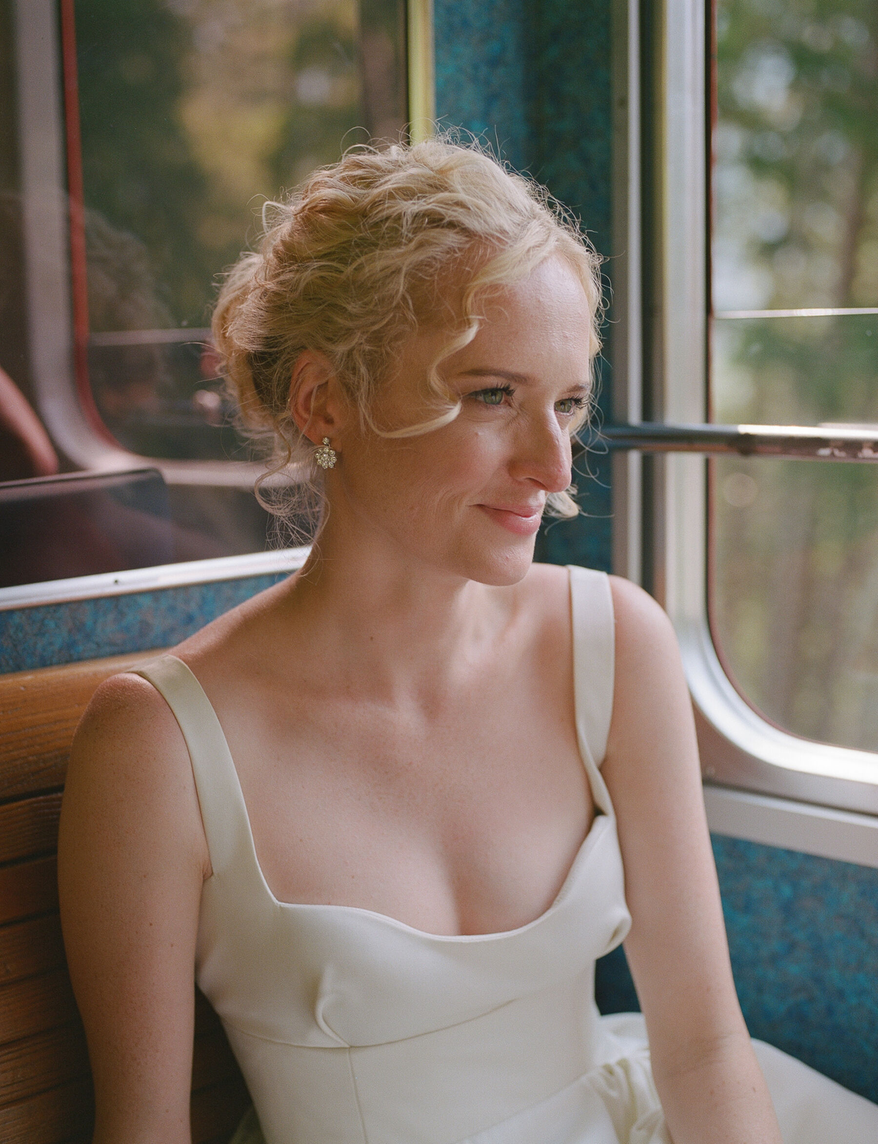 Georgia in Emilia Wickstead, For Her Classy & Elegant Black Tie Mountain Wedding in the Chamonix 28 Elegant bride with her long blonde hair tied up and tousled into her face, diamond earrings and an Emilia Wickstead wedding dress.