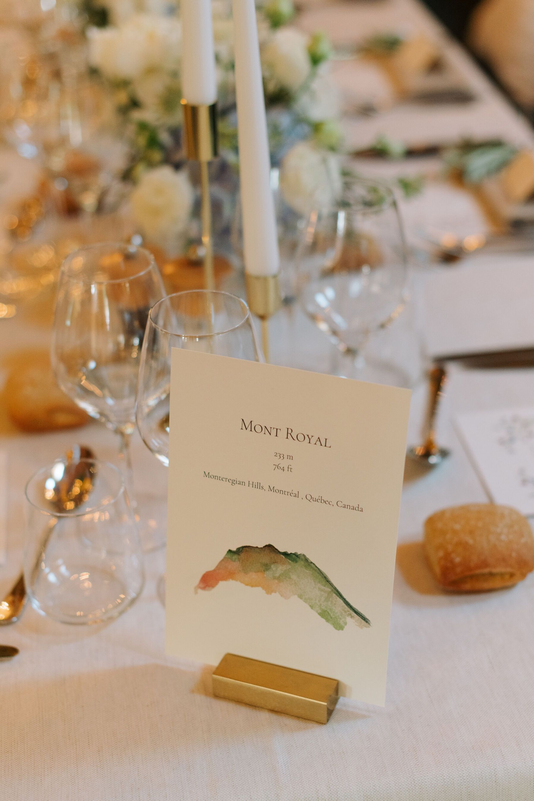 Georgia in Emilia Wickstead, For Her Classy & Elegant Black Tie Mountain Wedding in the Chamonix 34 Table name card with a water colour hand painted image of Mont Royal in Chamonix.