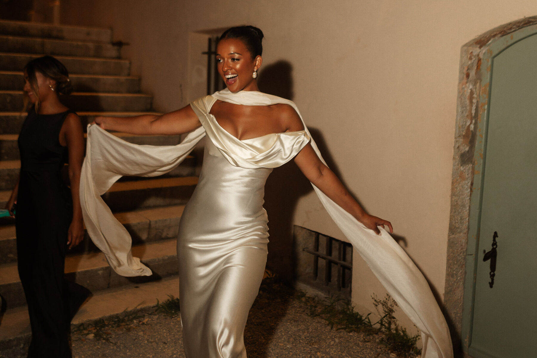 Bride dancing with wild abandon at her wedding