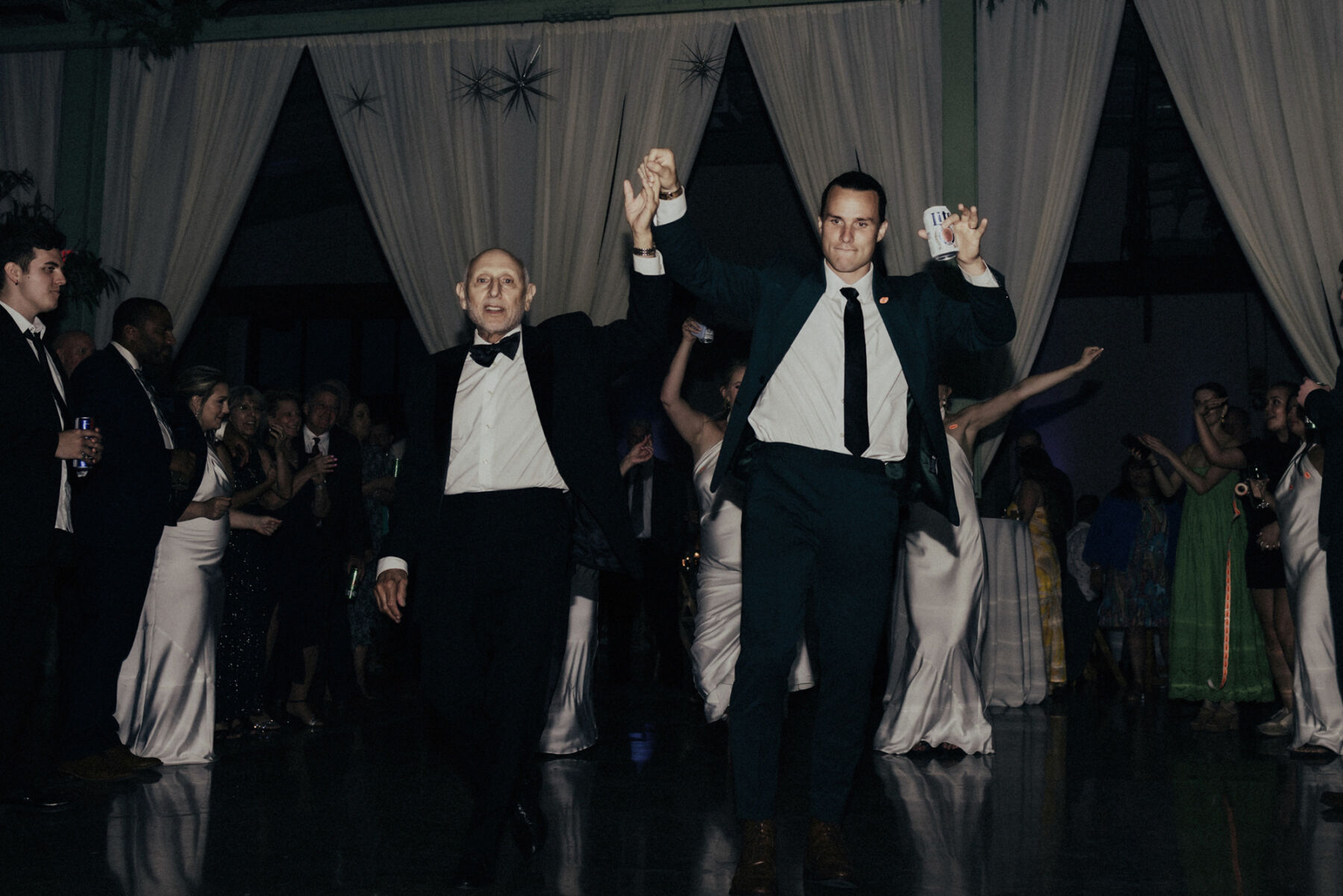 Groom and father of the groom on teh dance floor.