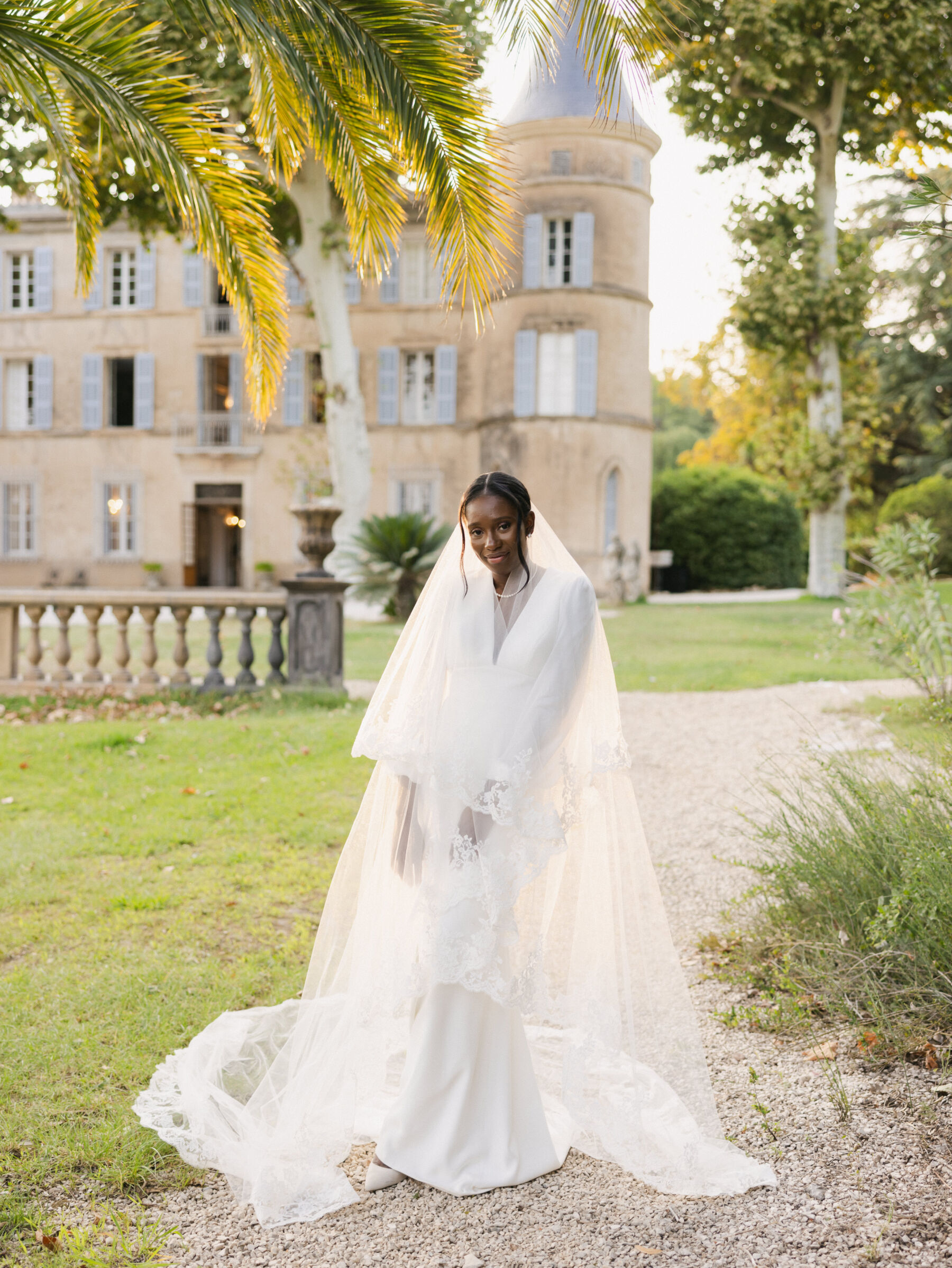 French Riviera Chic Wedding at Château Robernier, Provence, with Lawyer Chanel in Sassi Holford 27 Black bride in a Sassi Holford wedding dress. Wedding at Chateau Robernier in Cotignac, Provence, France. Sébastien Boudot Photography.