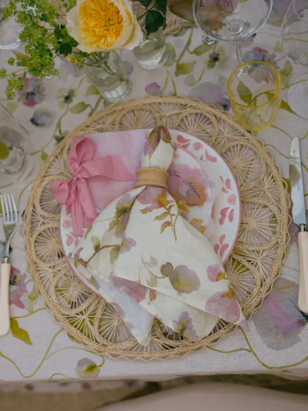 A beautiful pure linen cream napkin with pink & green watercolour flower design