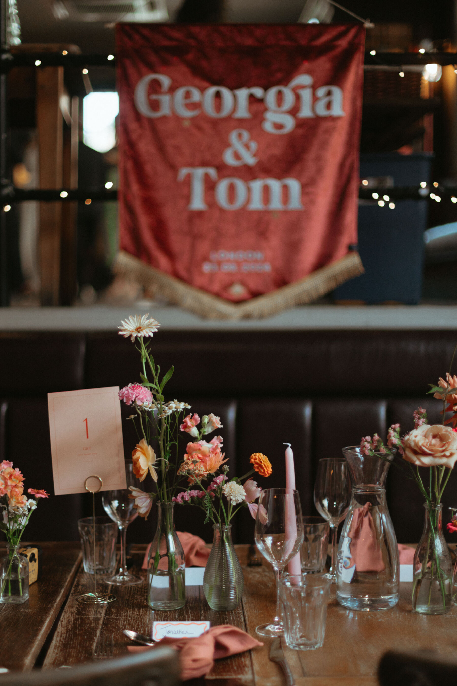 Georgia in Truvelle for her Modern London Wedding at The Depot in Islington 27 Personalised, fabric wedding sign by Tara Collette.