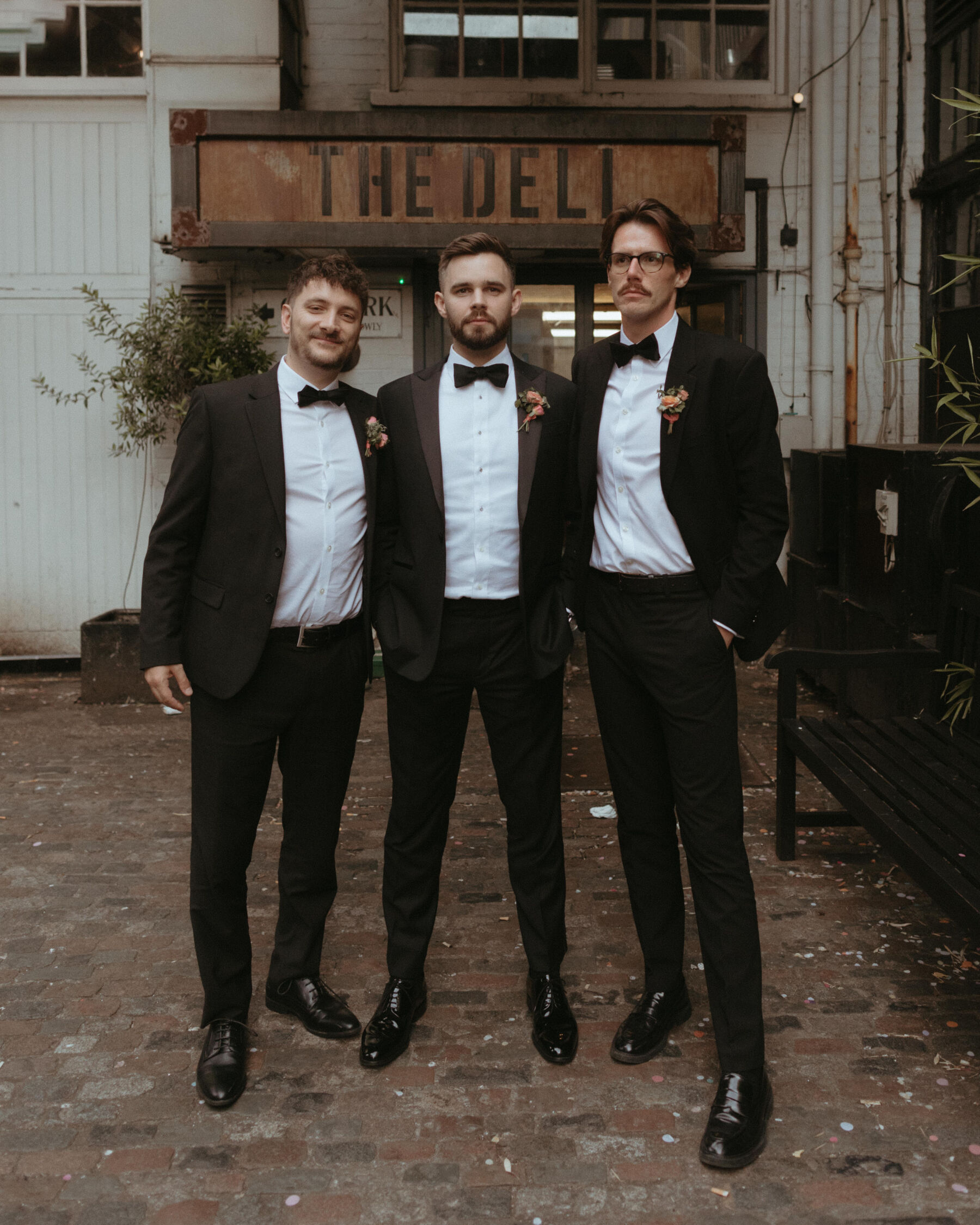 Georgia in Truvelle for her Modern London Wedding at The Depot in Islington 24 Modern groom and his groomsmen looking cool in black tie.