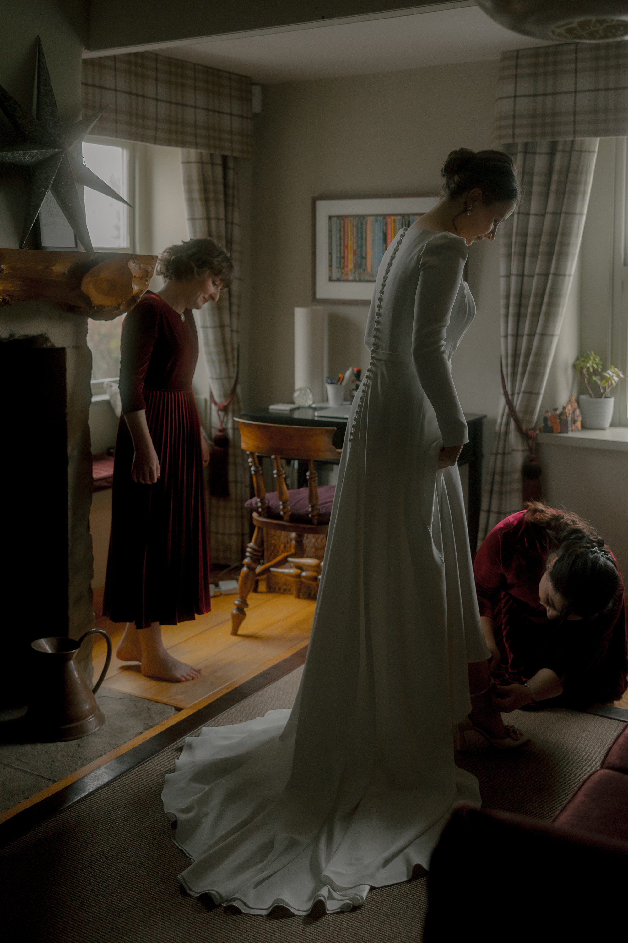 A Movie & Literary Inspired Romantic Christmas Wedding 44 Bride getting ready in the Verdi dress, by Suzanne Neville.