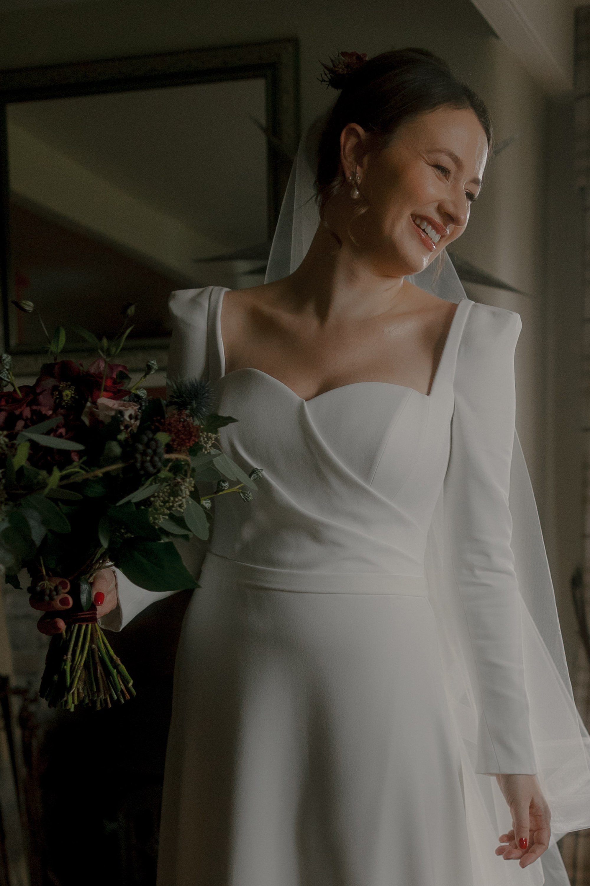 A Movie & Literary Inspired Romantic Christmas Wedding 43 Smiling happy bride in the Verdi dress, by Suzanne Neville.