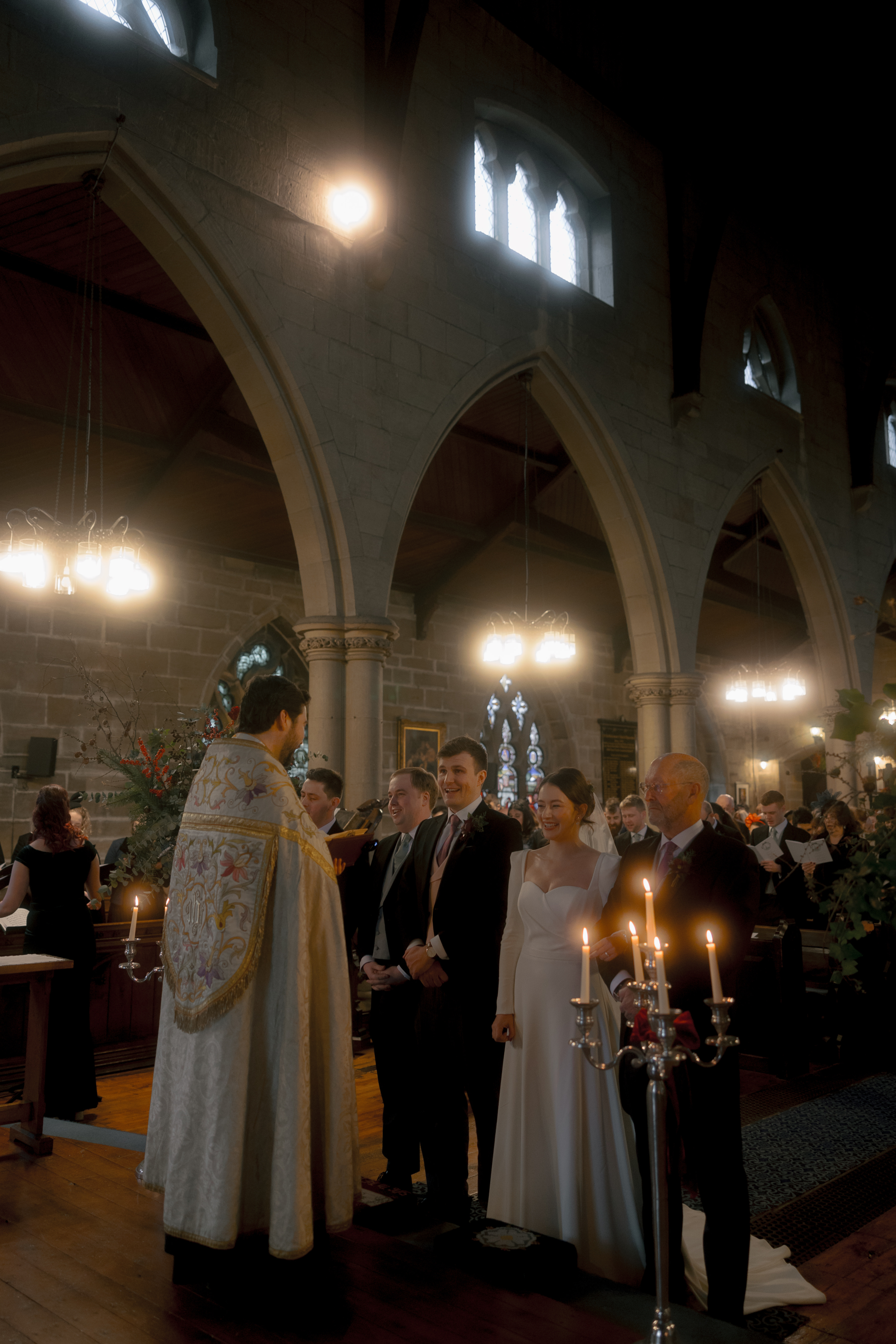 A Movie & Literary Inspired Romantic Christmas Wedding 47 Bride and groom during their Christmas wedding ceremony at church.