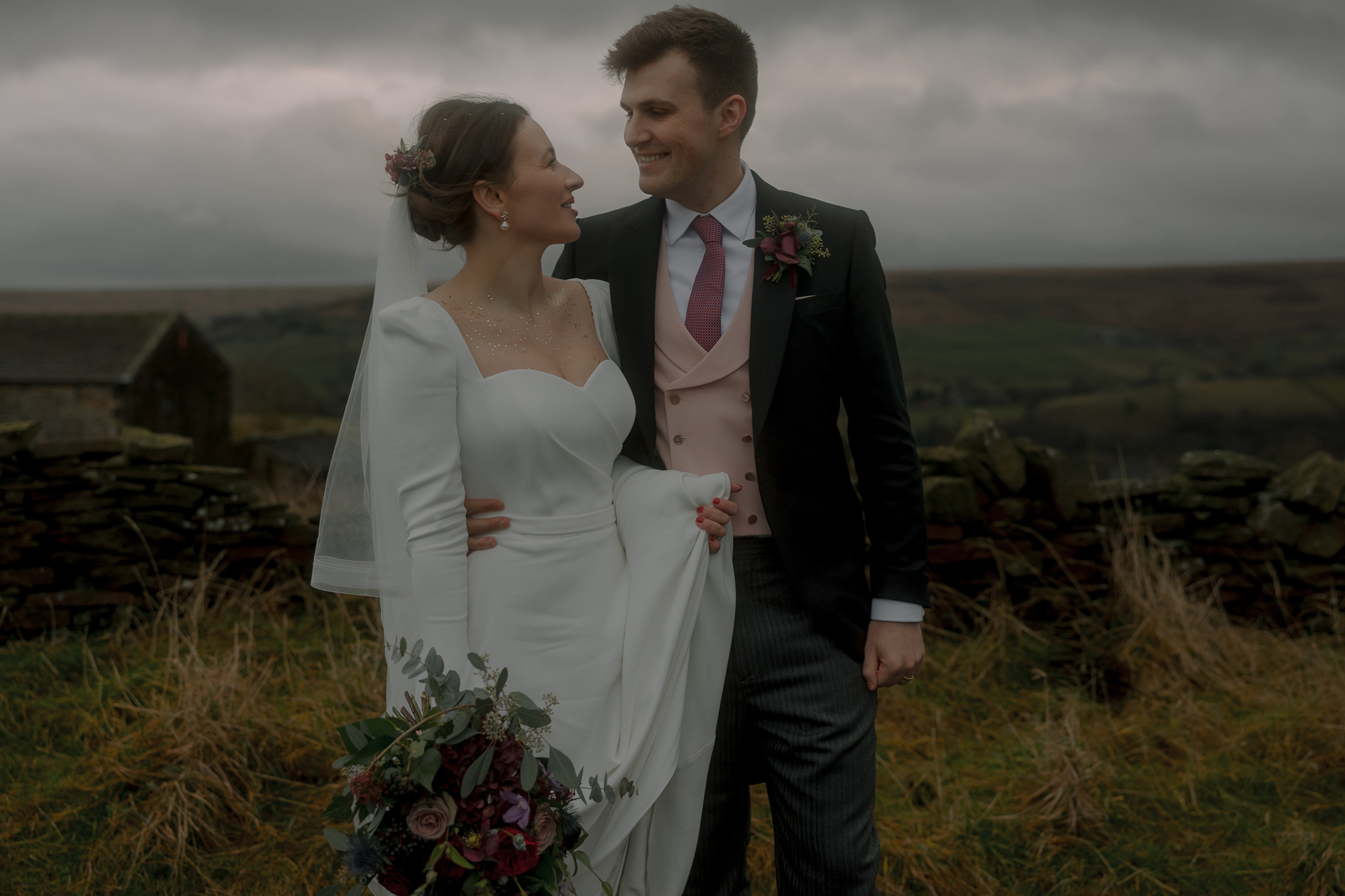 A Movie & Literary Inspired Romantic Christmas Wedding 56 Bride in a long sleeved Suzanne Neville wedding dress on her Christmas wedding day.