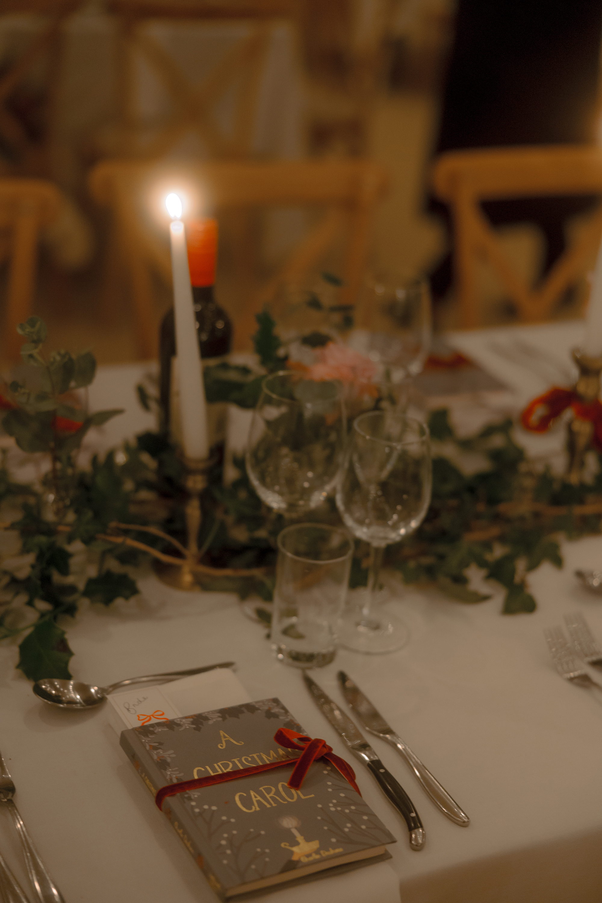 A Movie & Literary Inspired Romantic Christmas Wedding 65 Christmas wedding reception with guests gifted a copy of 'A Christmas Carol' book. asa wedding favour.