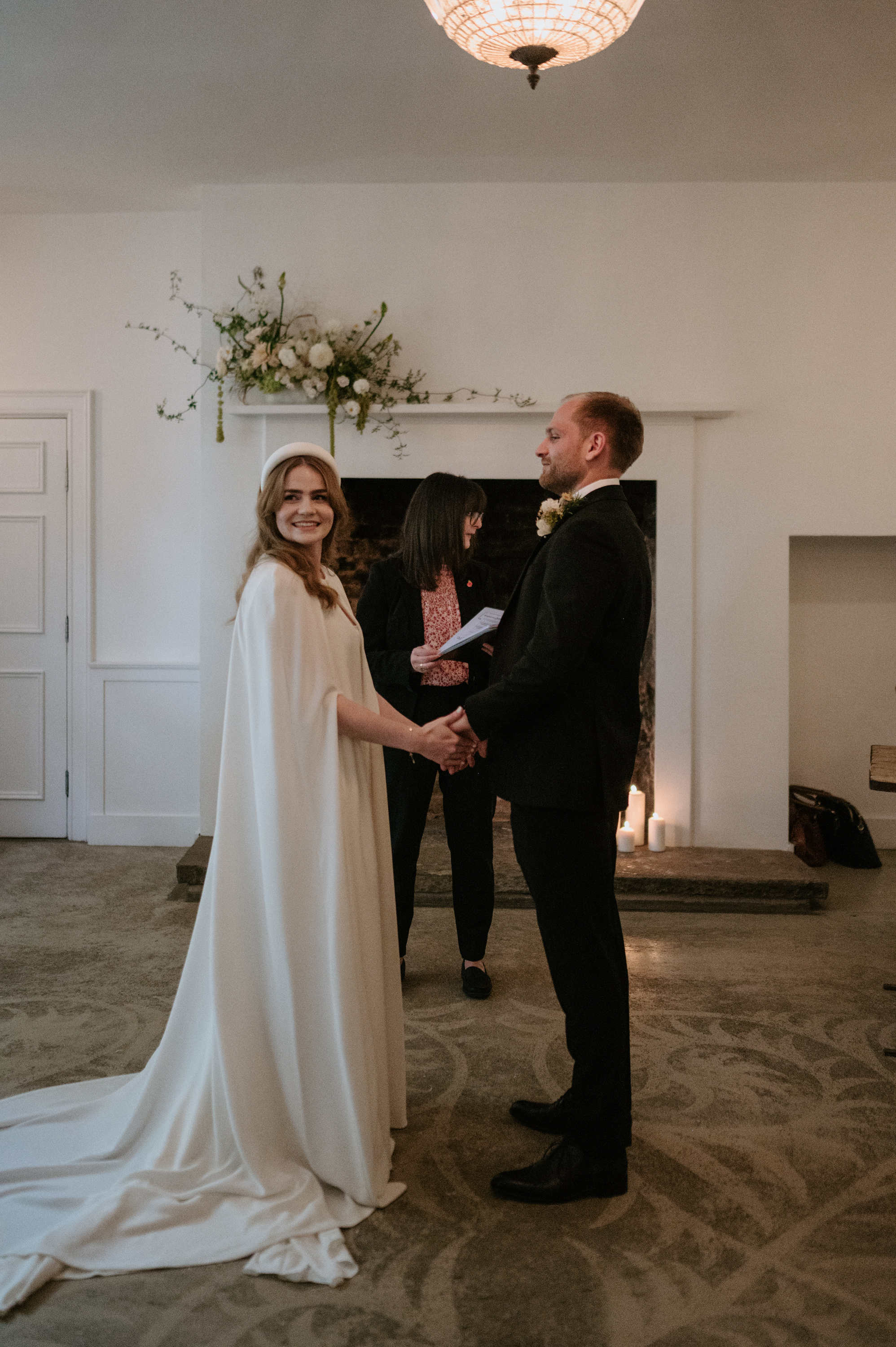 Bride and groom during their wedding ceremony at Aswarby Rectory. 