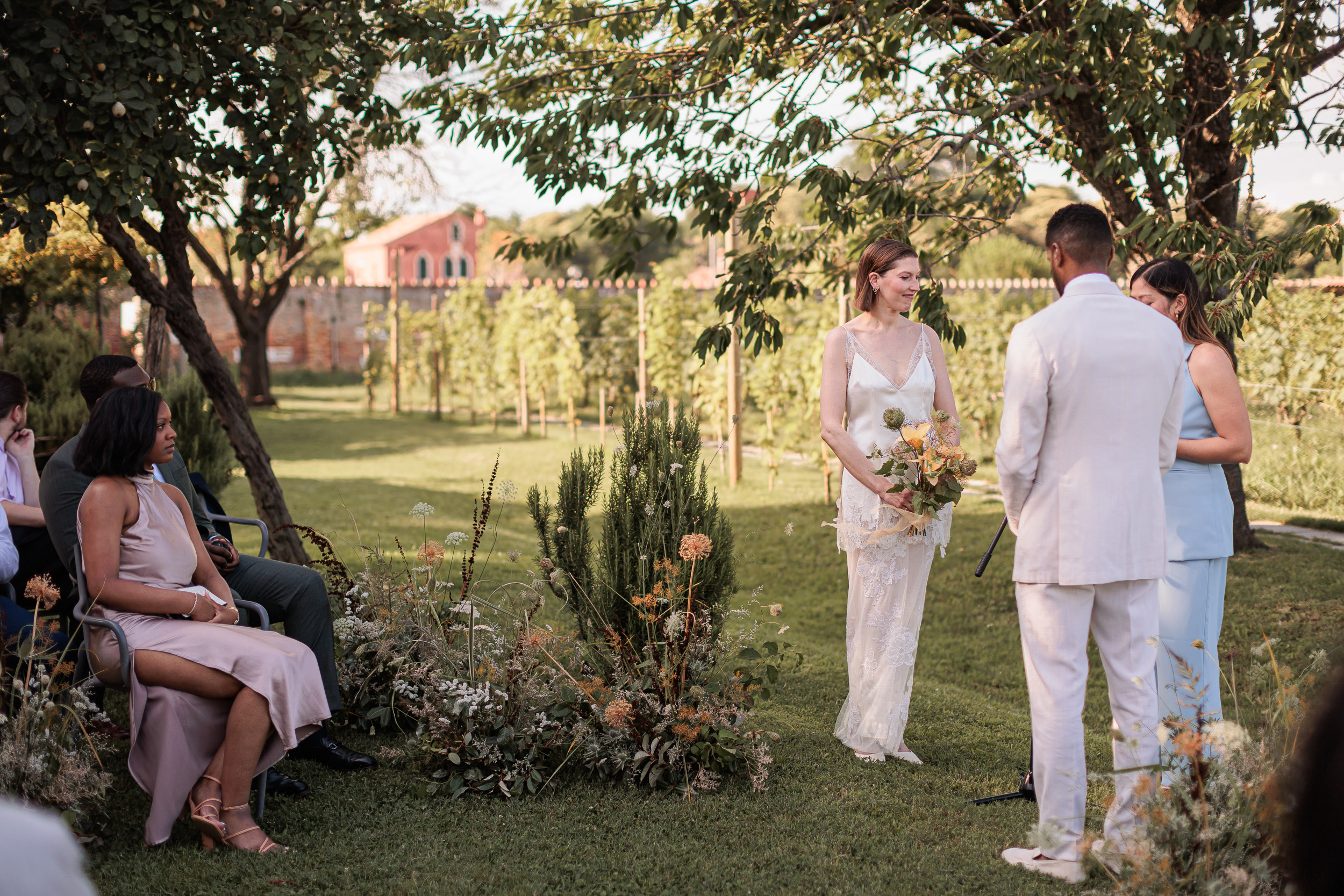 Danielle Frankel Intimate Italian Wedding 51 1 - Kathryn in Danielle Frankel for her Intimate Italian Wedding Outdoor wedding ceremony with meadow flowers and a bride in Danielle Frankel.