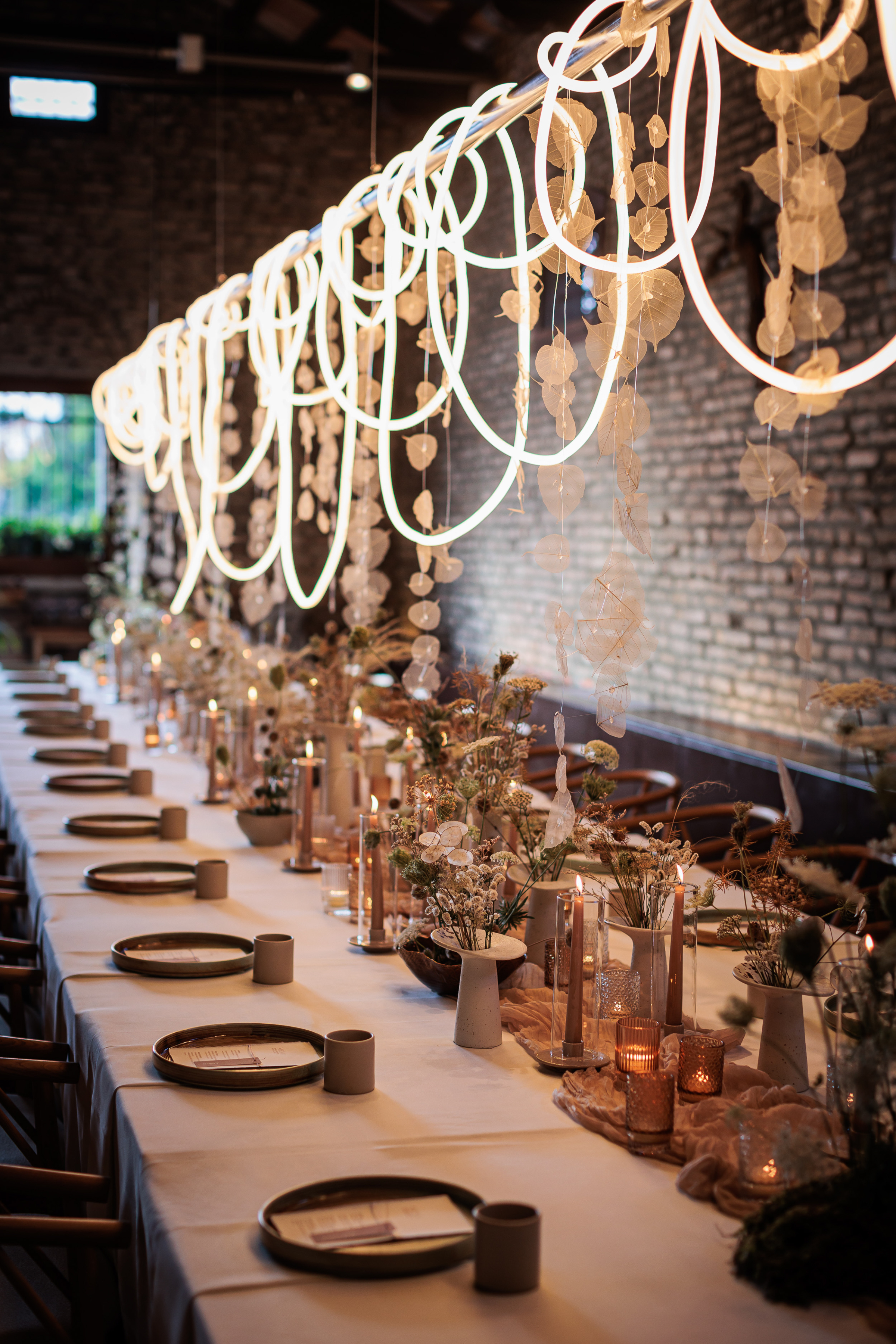 Danielle Frankel Intimate Italian Wedding 98 1 - Kathryn in Danielle Frankel for her Intimate Italian Wedding Rustic wedding table setting on long table lined with dried flowers.