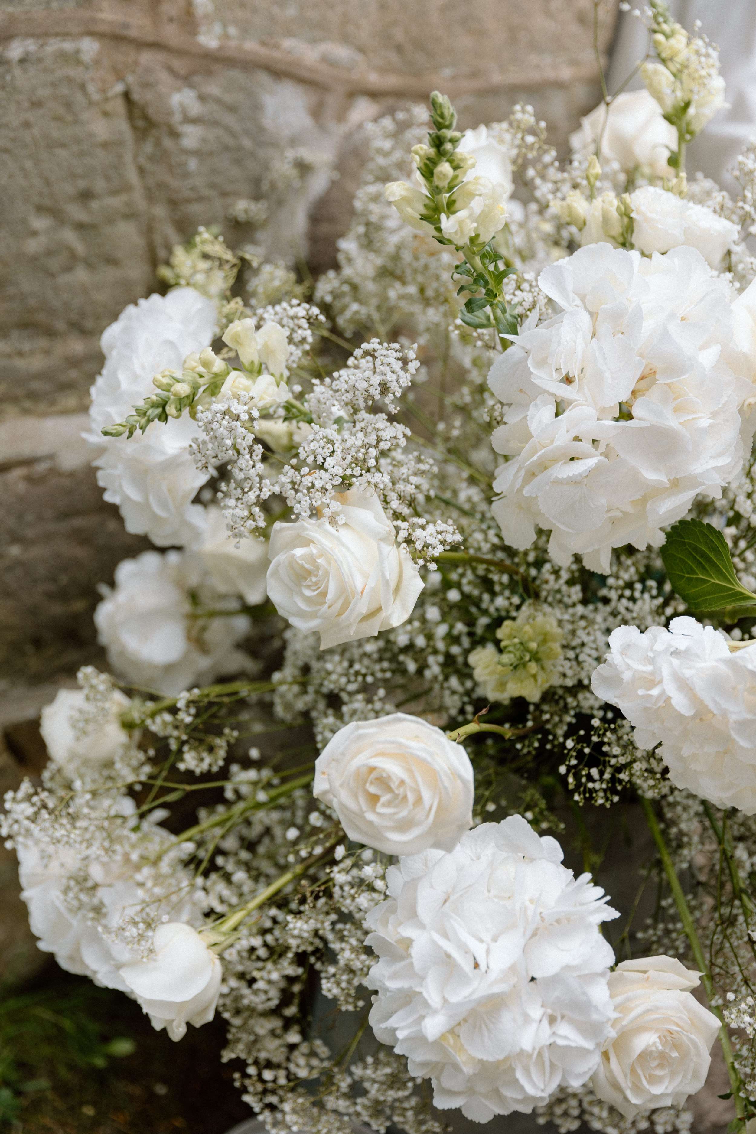 White wedding flowers - roses and gypsophila 