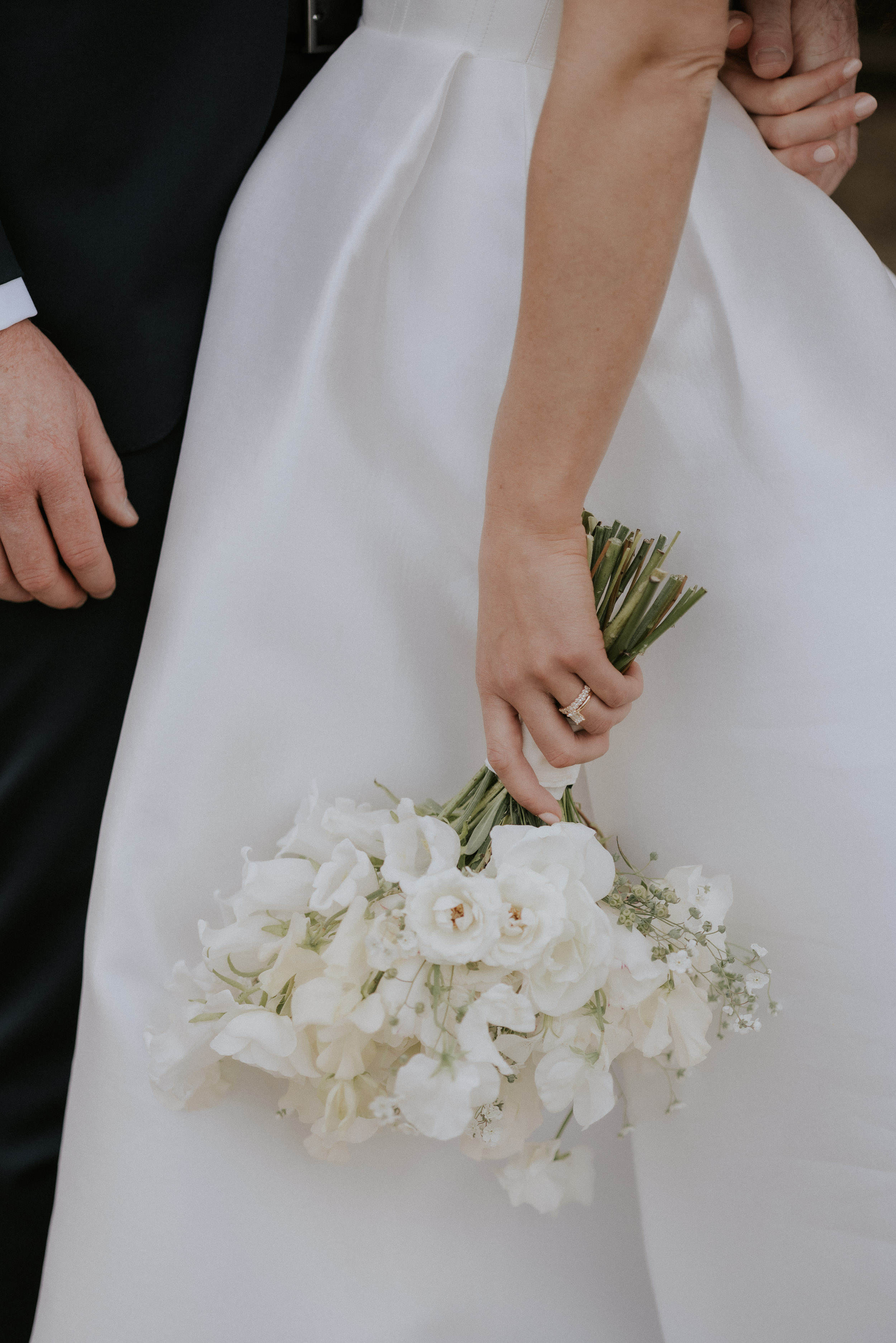 A Romantic Summer Wedding at Kin House in Wiltshire 39 Medium sized bridal bouquet of white flowers. Maja Tsolo Photography.