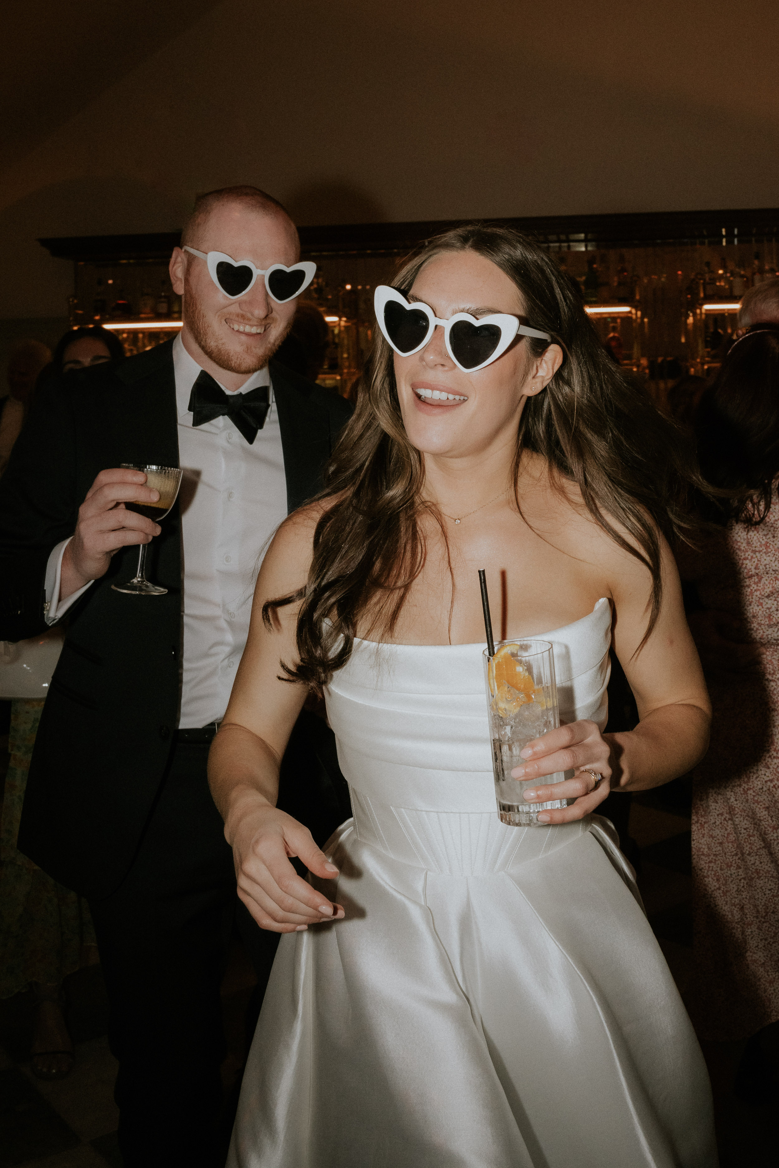 A Romantic Summer Wedding at Kin House in Wiltshire 55 Bride and groom in heart shaped glasses on the dancefloor at their wedding at Kin House Wiltshire. Maja Tsolo Photography.