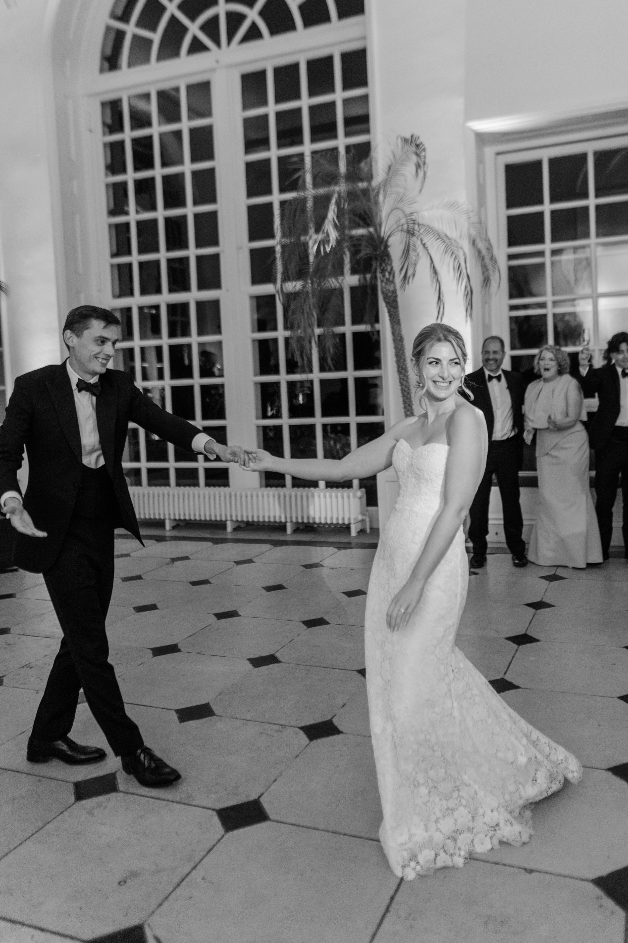 A Dreamy Kew Gardens Glasshouse Wedding Planned by Rachel Dalton 44 Bride and groom taking their first dance at Kew Gardens.