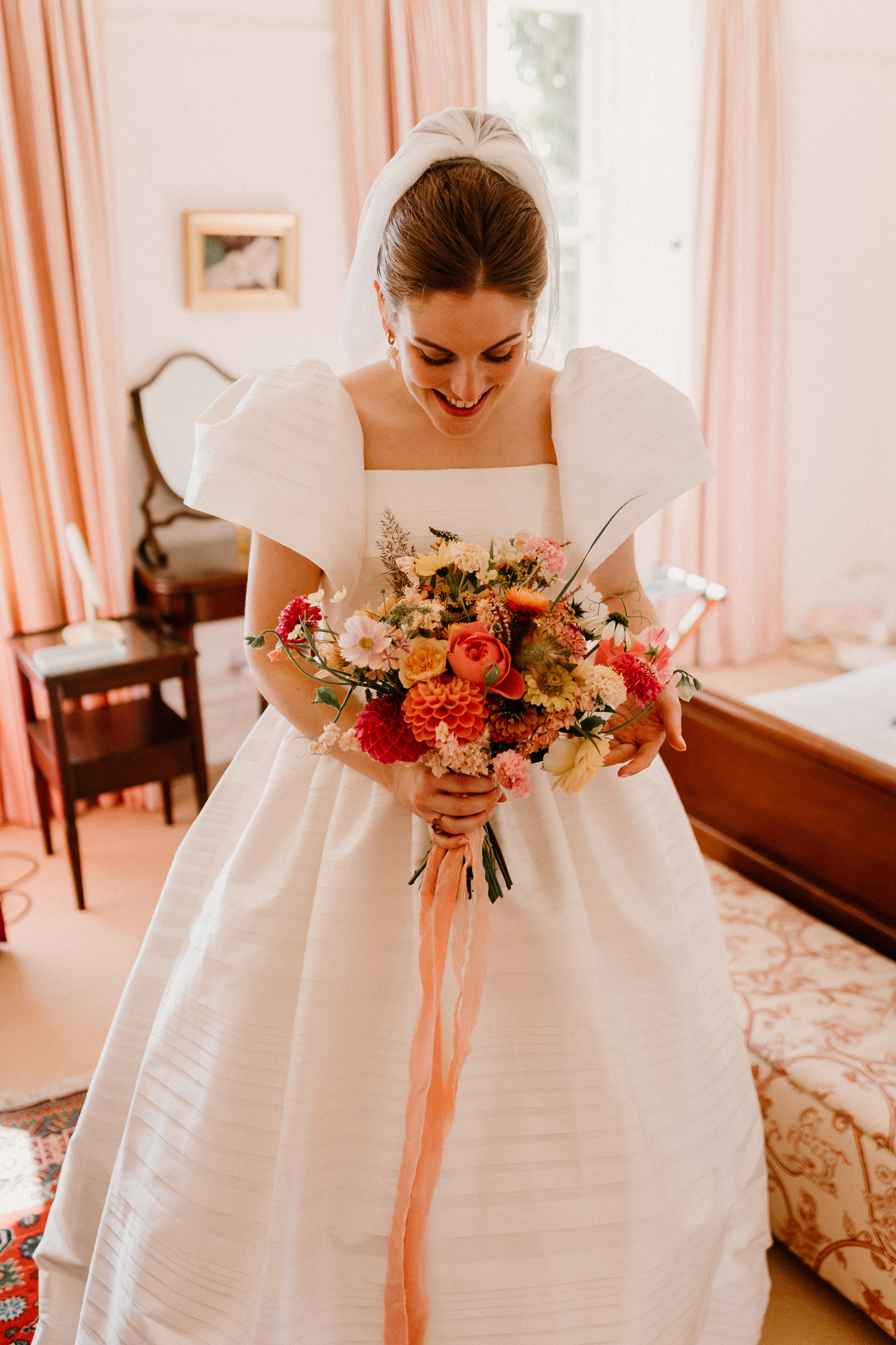 Hannah in Jesus Peiro for her Intimate Brunton House Wedding in Northumberland 19 Bride wearing a Puff sleeved, textured wedding dress by Jesus Peiro.