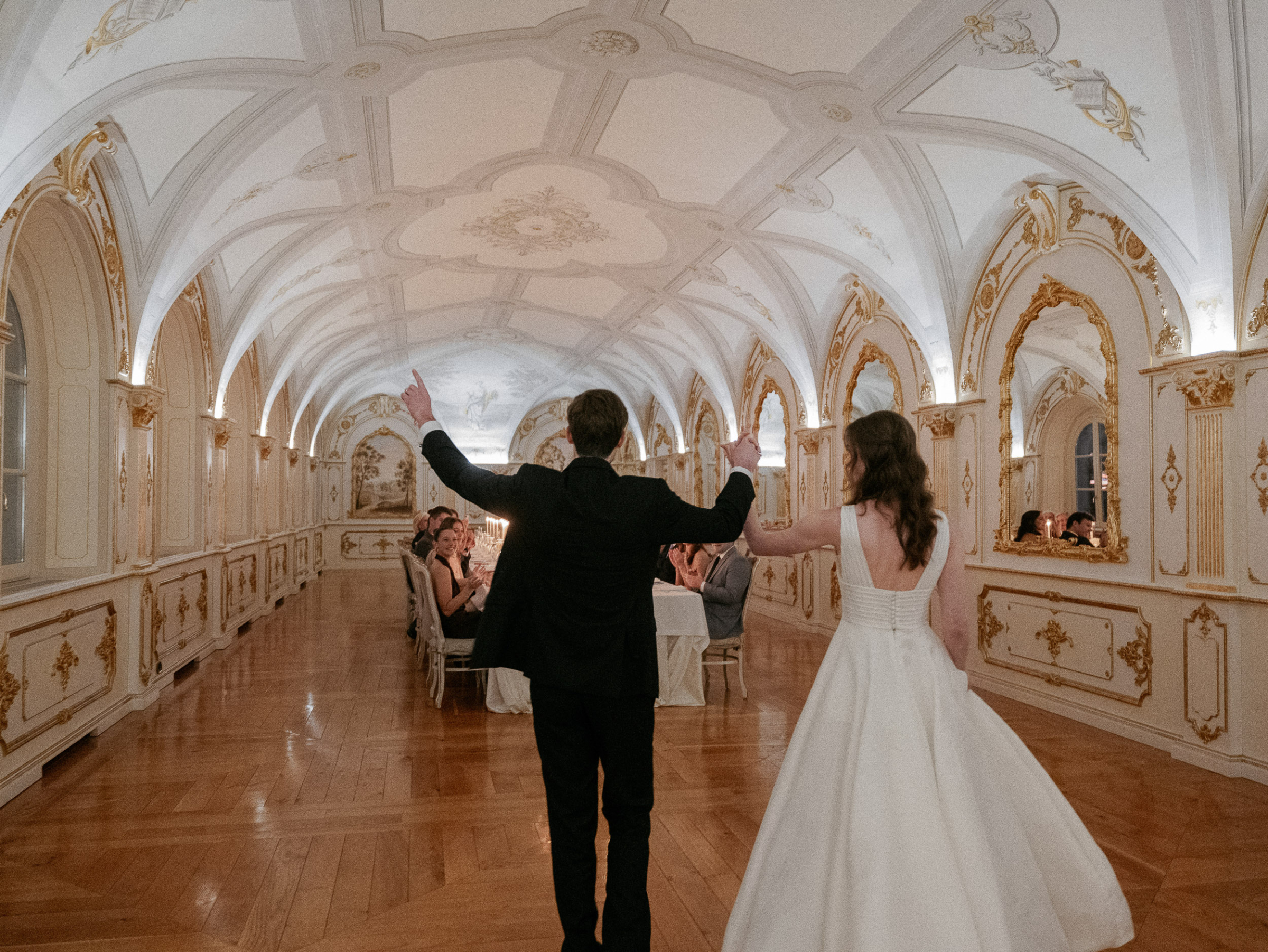 An Elegant Destination Wedding in Cortona, Italy, with a Peter Langner Gown 37 Bride and groom arriving joyously at their wedding reception at Relais La Corte Dei Papi in Cortona.