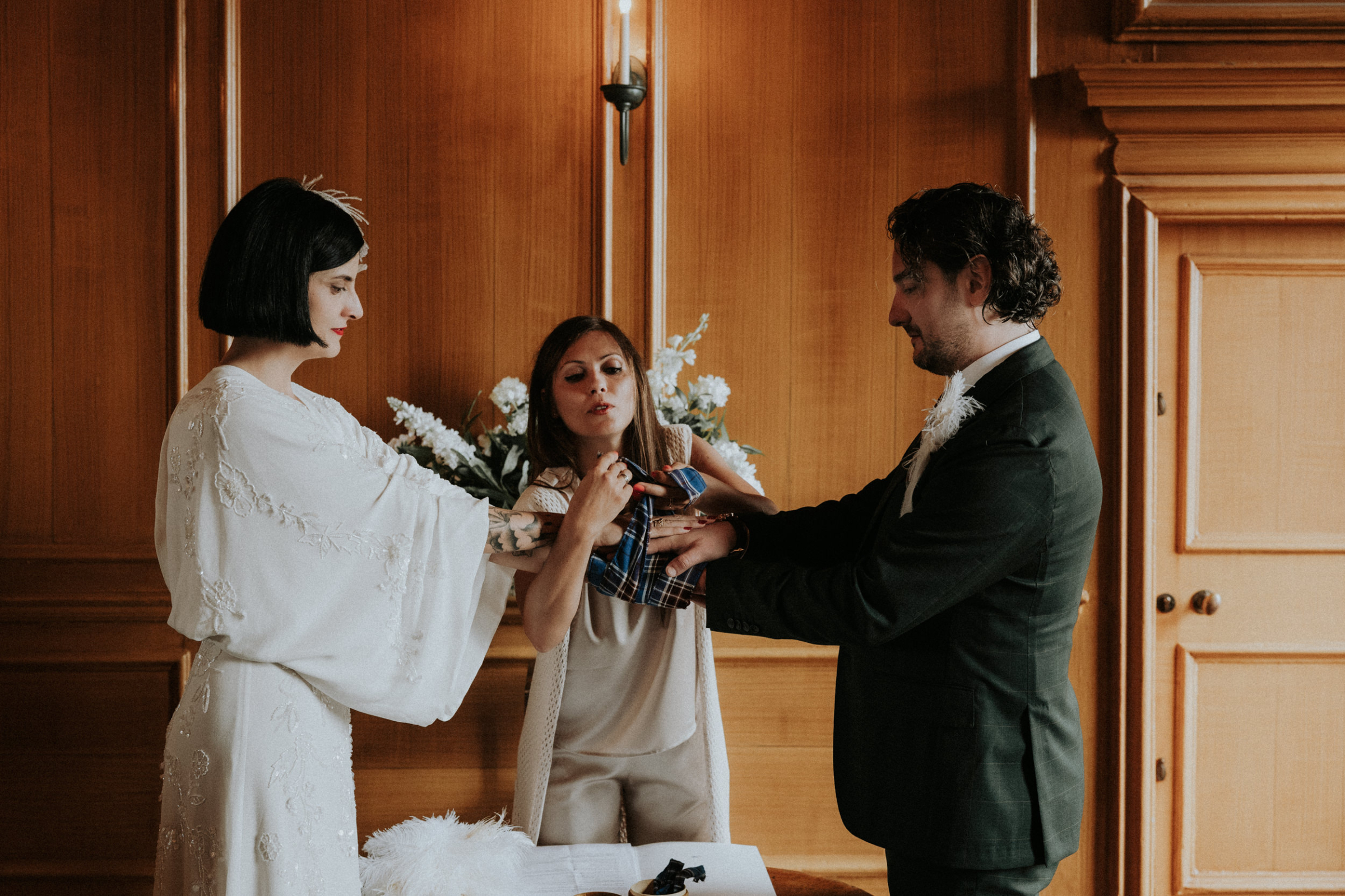 Handfasting wedding ceremony at Riddles Court in Edinburgh. Bernadeta Kupiec Photography.