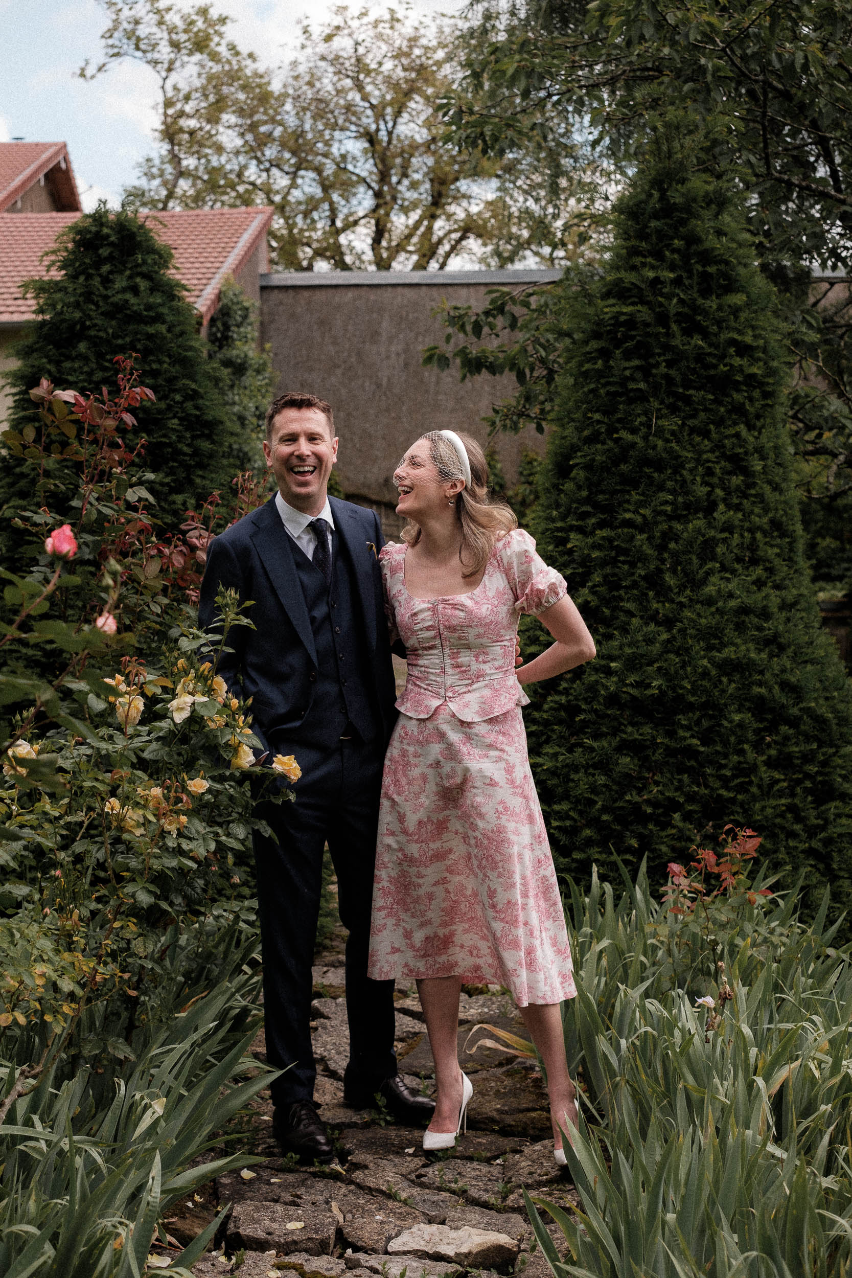 A beautiful bride in a romantic two-piece Annina Dirndl outfit for an intimate French village wedding in spring. Captured by Camille Huguenot, this stylish non-traditional look is perfect for a countryside celebration filled with charm and meaning. Discover more tiny weddings, fashion-forward brides and real love stories on Love My Dress.