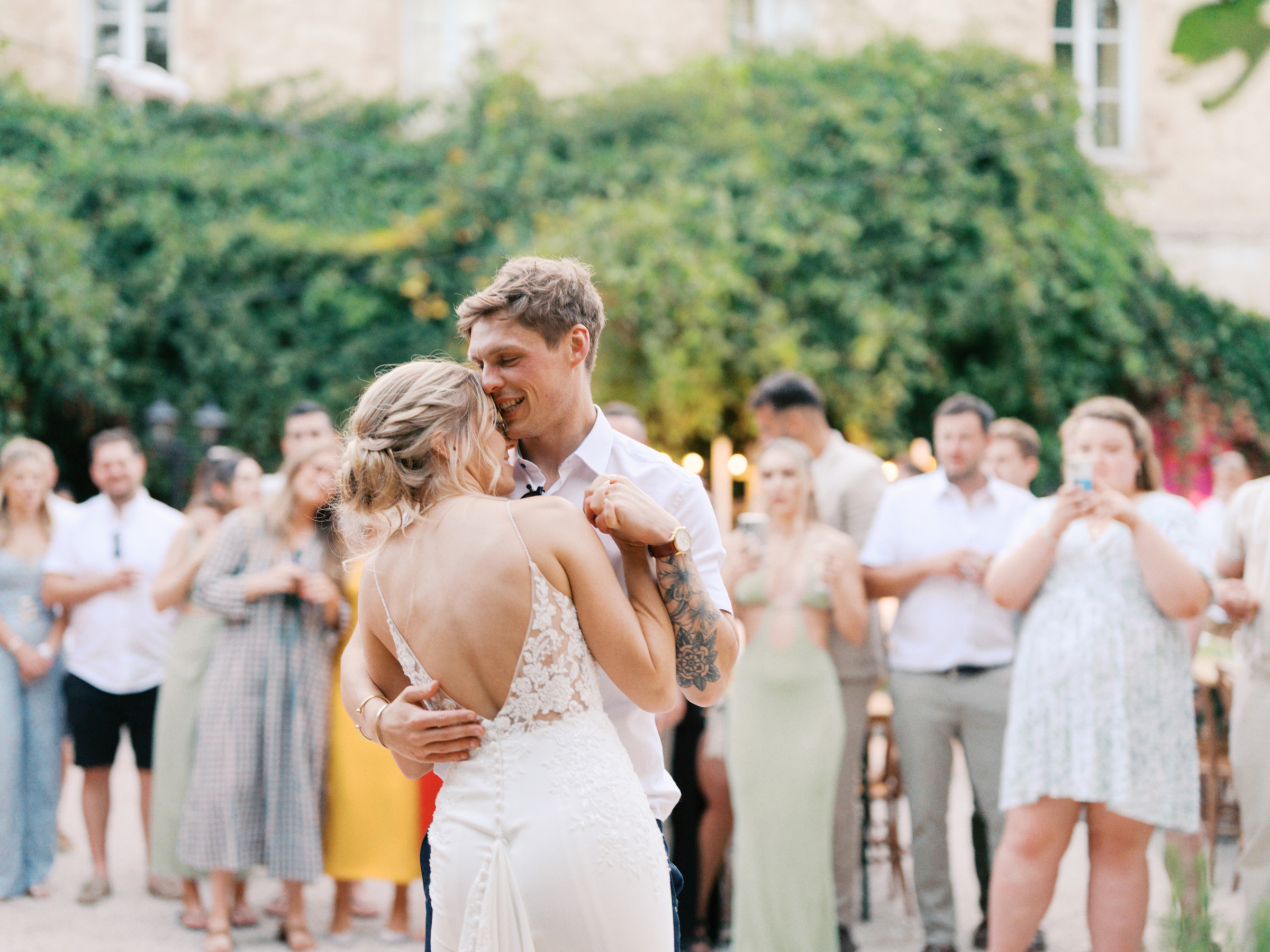 Bride and groom dancing at Chateau de Robernier in Provence, South of France.