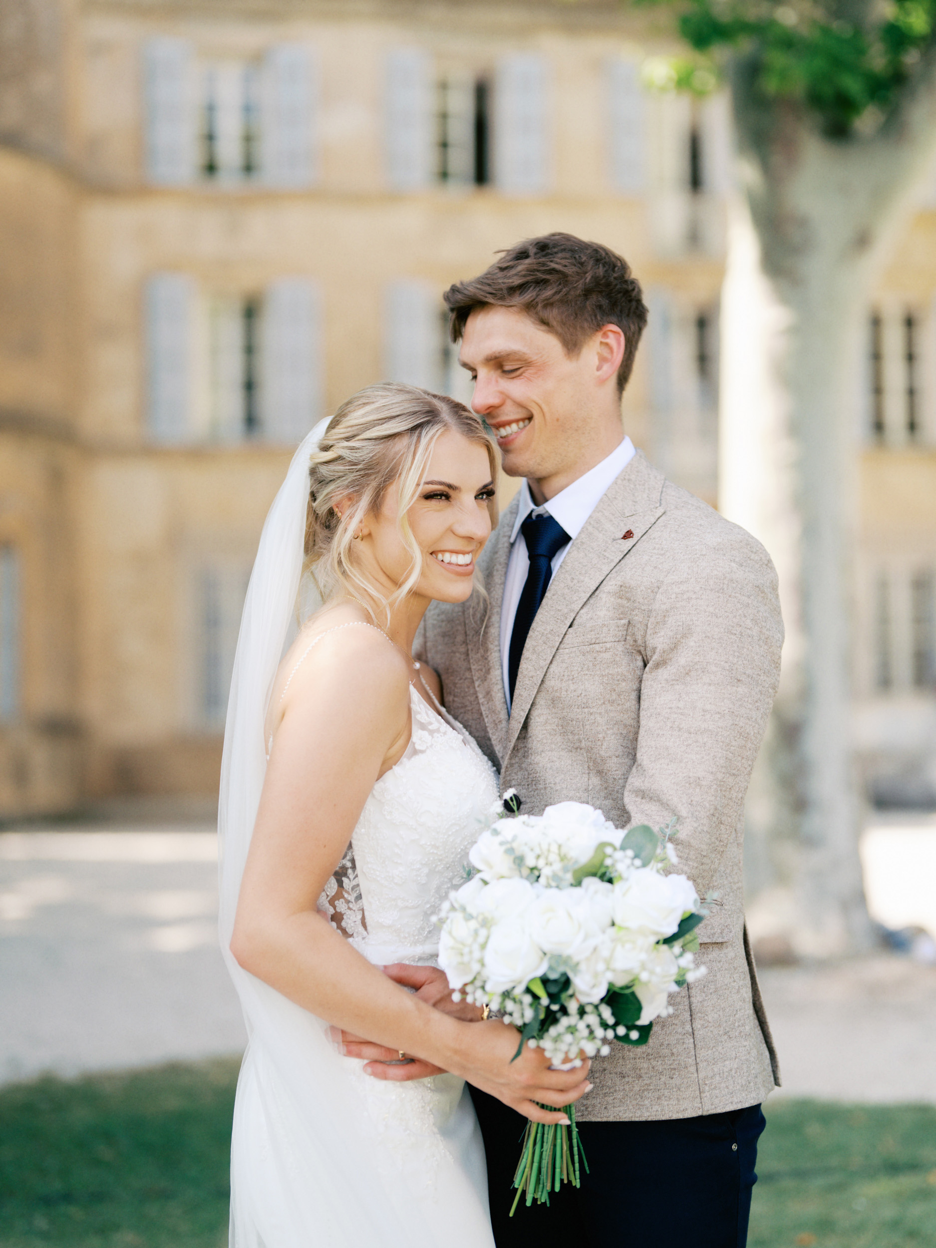 An Elegant Modern Wedding at Chateau de Robernier 67 Bride and groom at Chateau de Robernier in Provence, South of France.