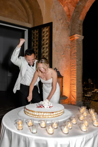 Destination wedding cake cutting