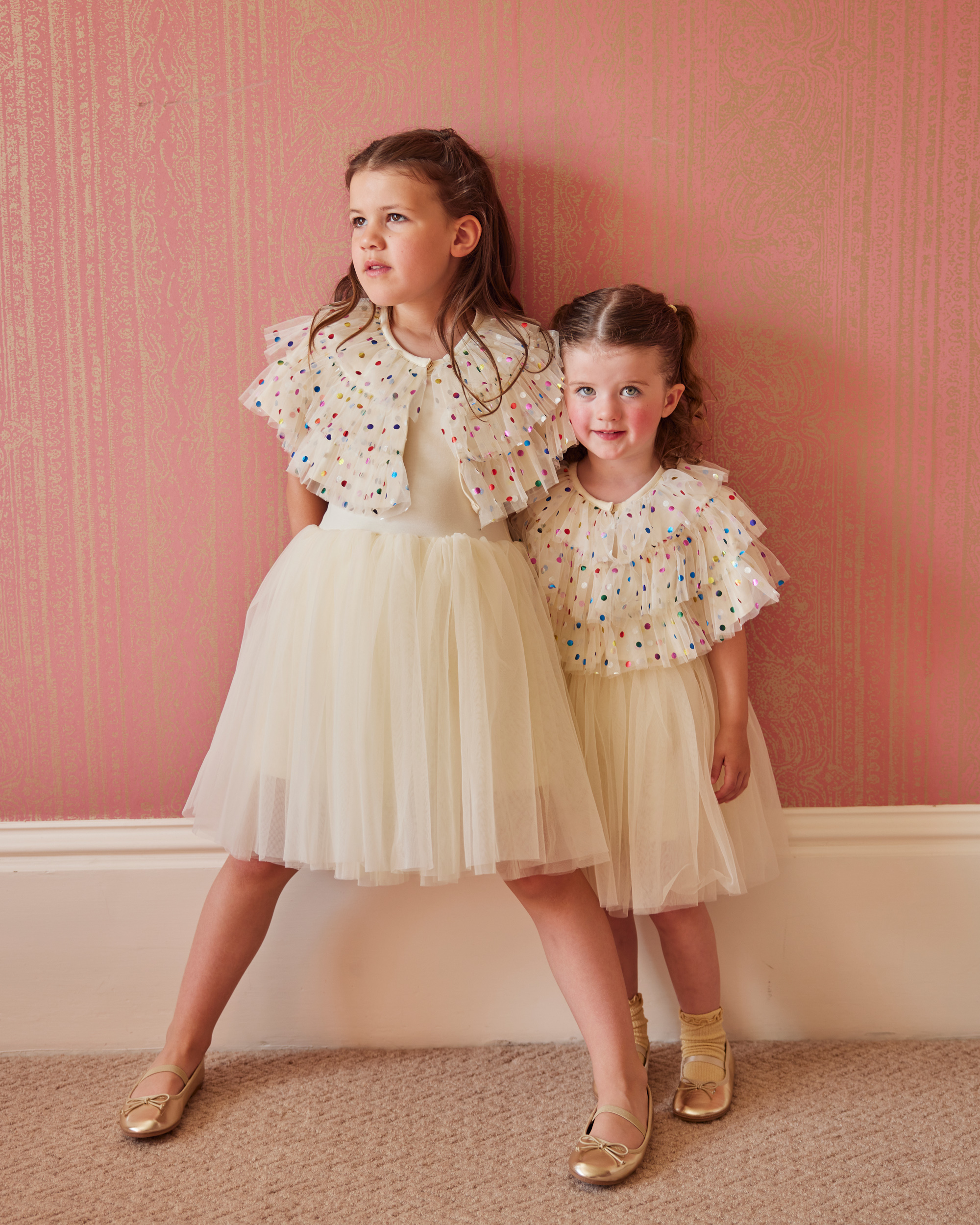 Alex in Emma Beaumont for her Ibiza & Disco Inspired Wedding at Wilderness Reserve 37 Two Flower girls with tulle ballerina dresses and tiered shrugs with colourful polkadots.