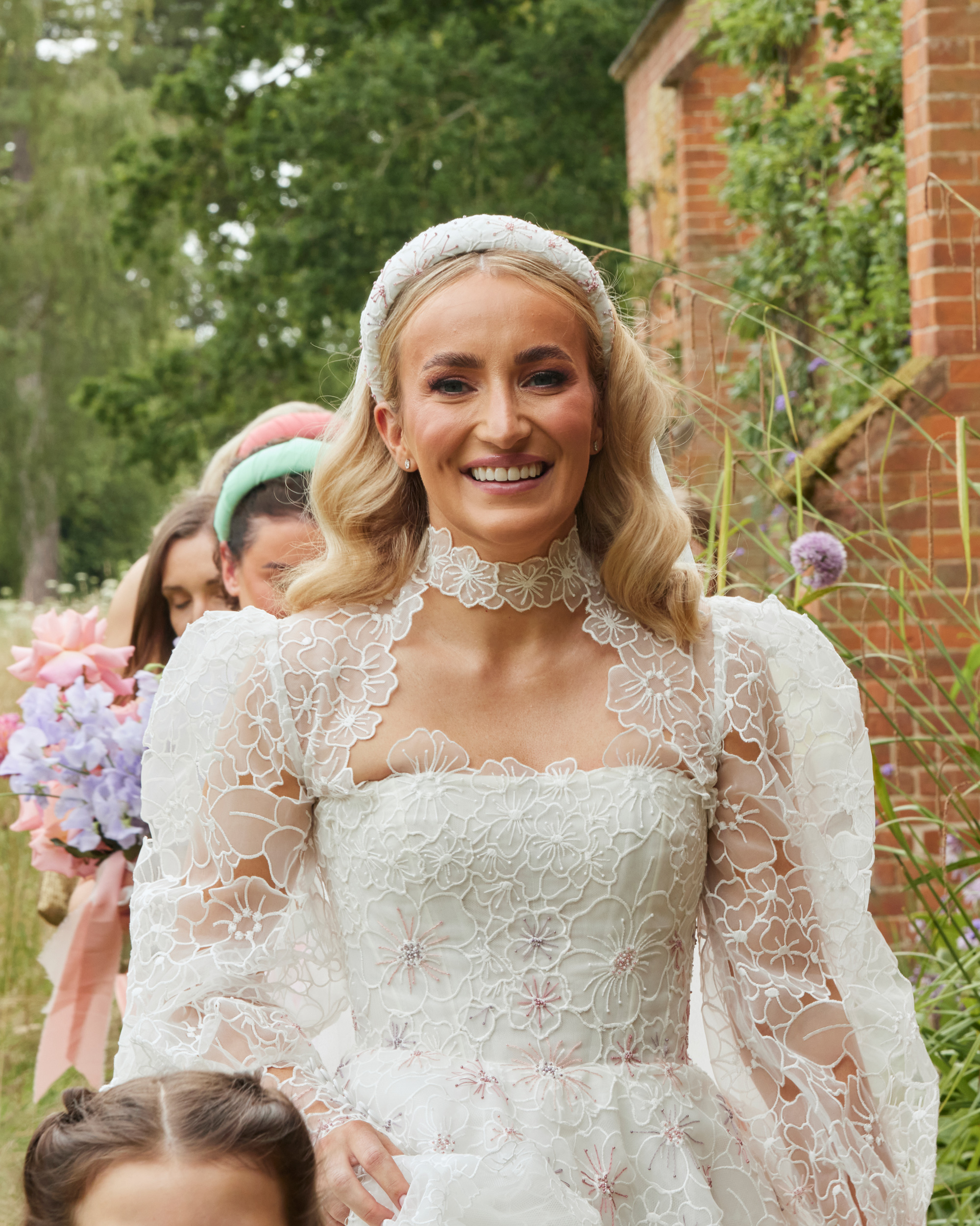 Alex in Emma Beaumont for her Ibiza & Disco Inspired Wedding at Wilderness Reserve 38 Emma Beaumont bride wearing a puff sleeve wedding dress.